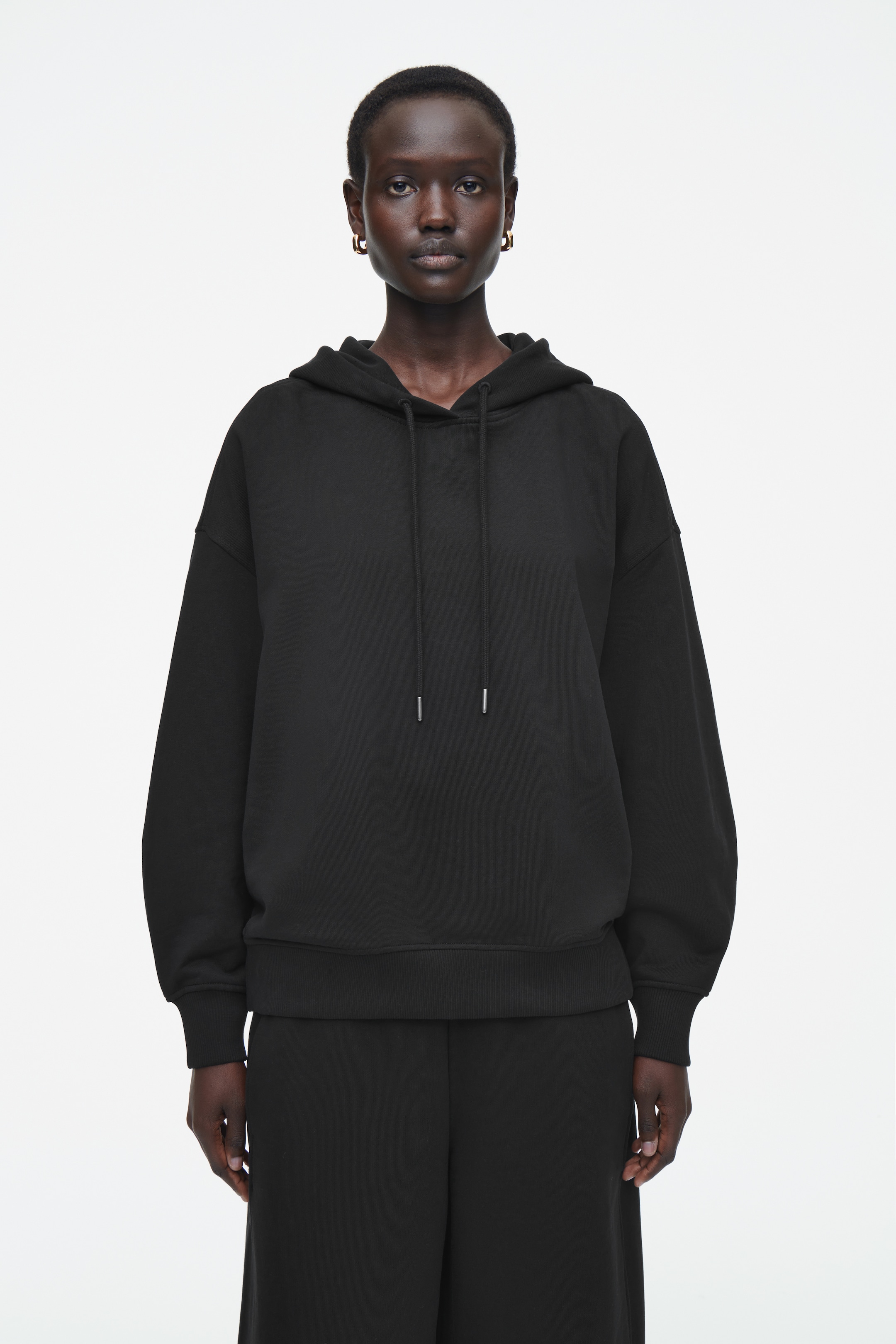Visualizza immagine più grande: FELPA OVERSIZE IN JERSEY CON CAPPUCCIO - NERO - DONNA | H&M IT 1