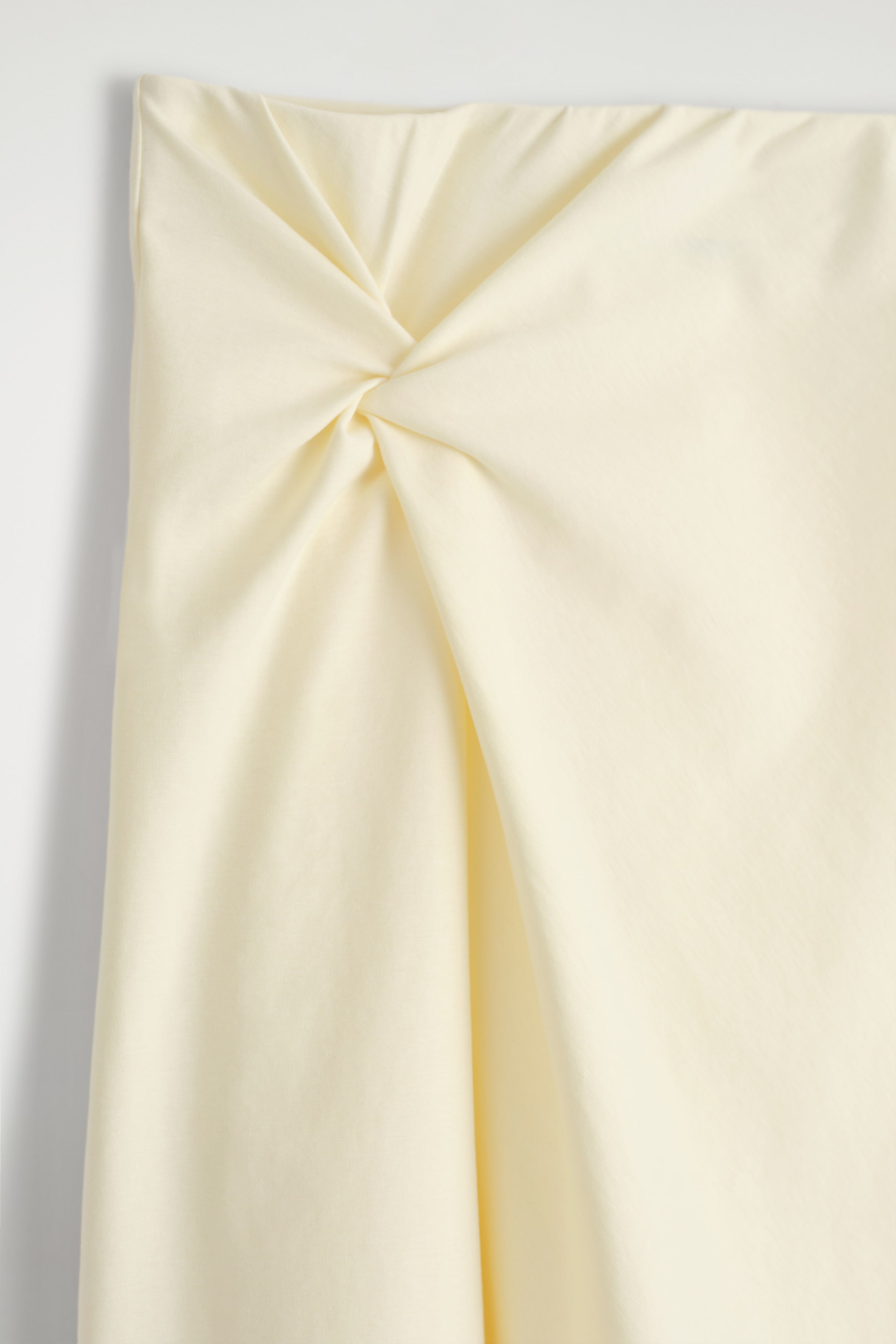 Ingrandisci l'immagine: TWIST-DETAIL MIDI SKIRT - BUTTER YELLOW - DONNA | H&M CH 6