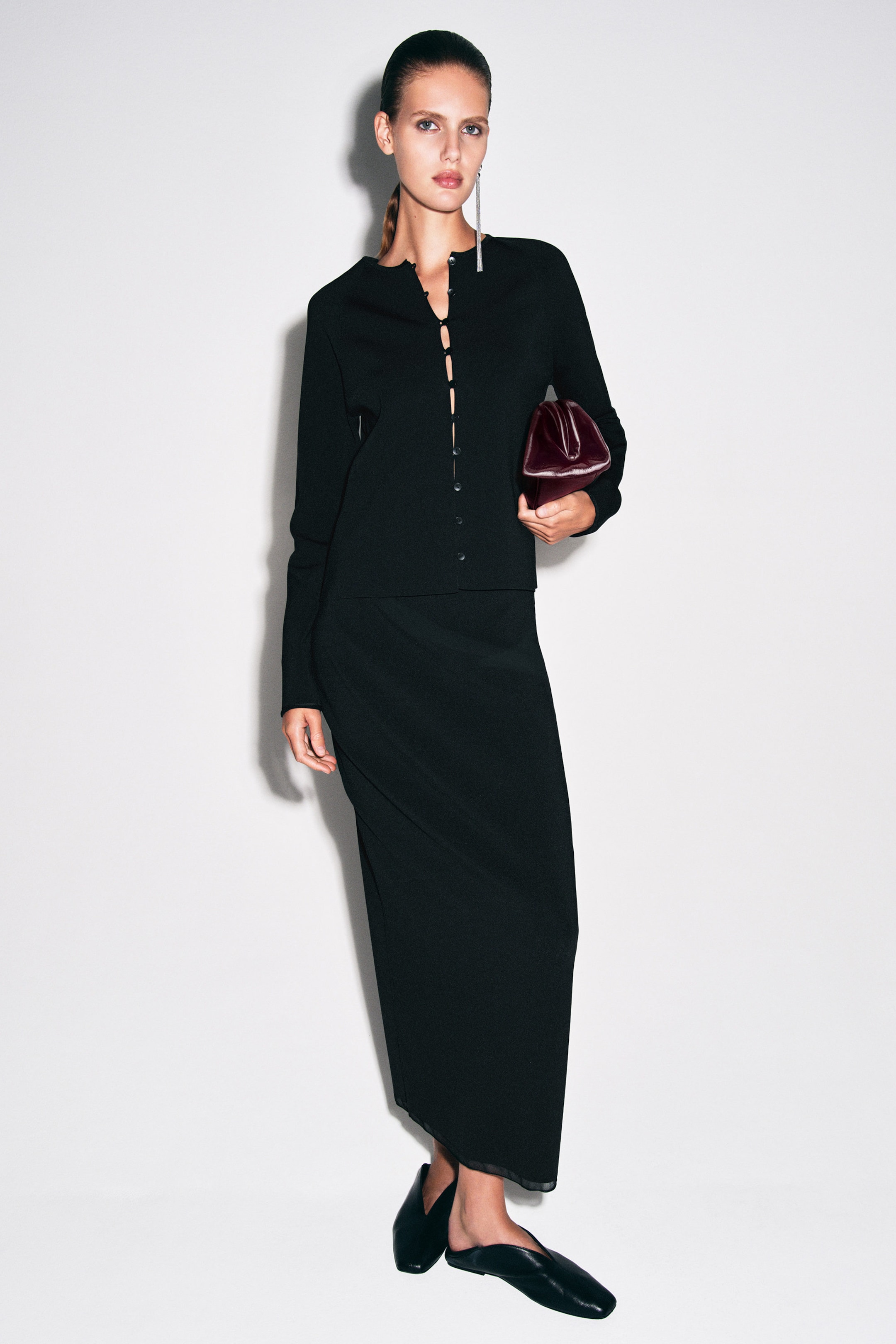 JUPE MIDI EN MAILLE FINITION DIAPHANE