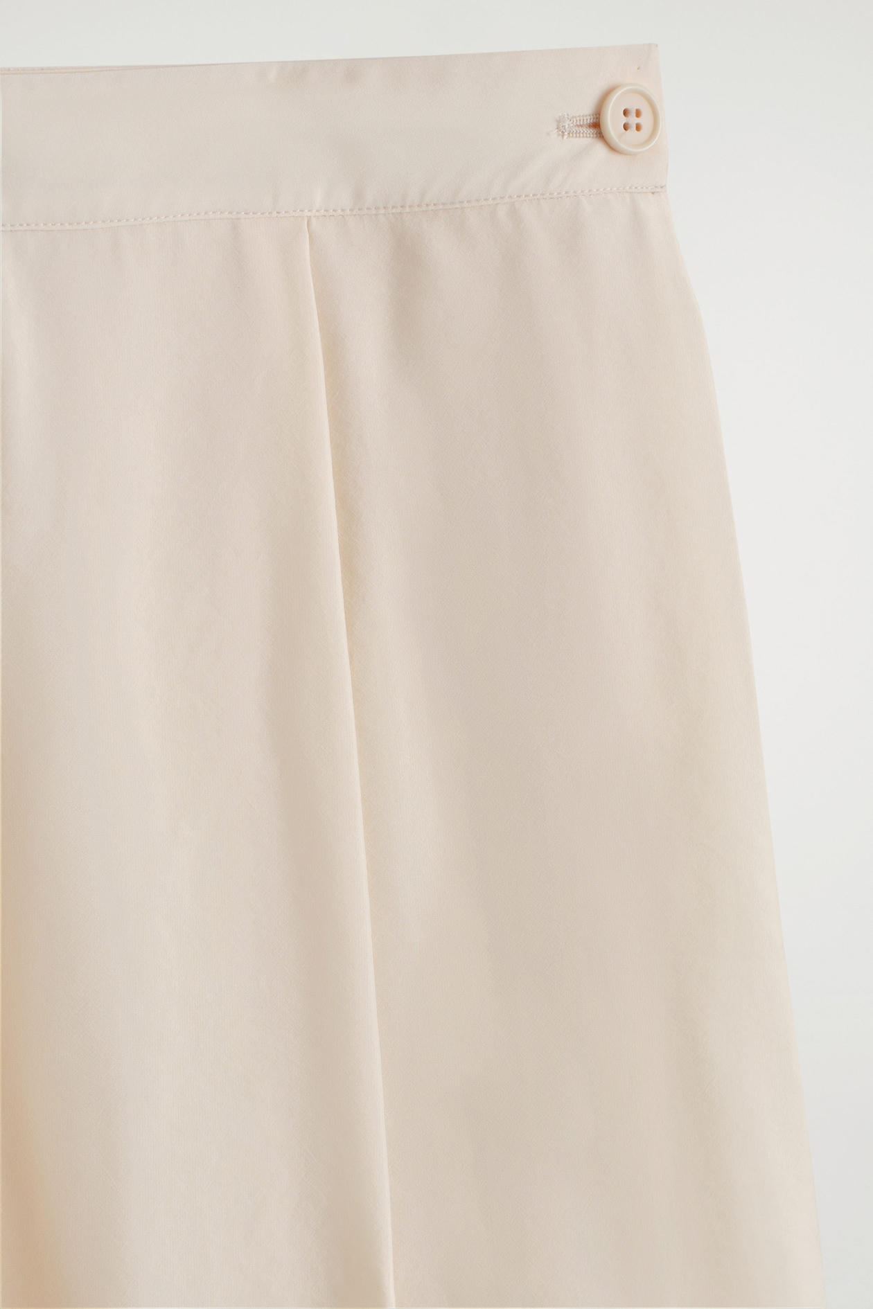 PLEATED A-LINE MIDI SKIRT — CREAM