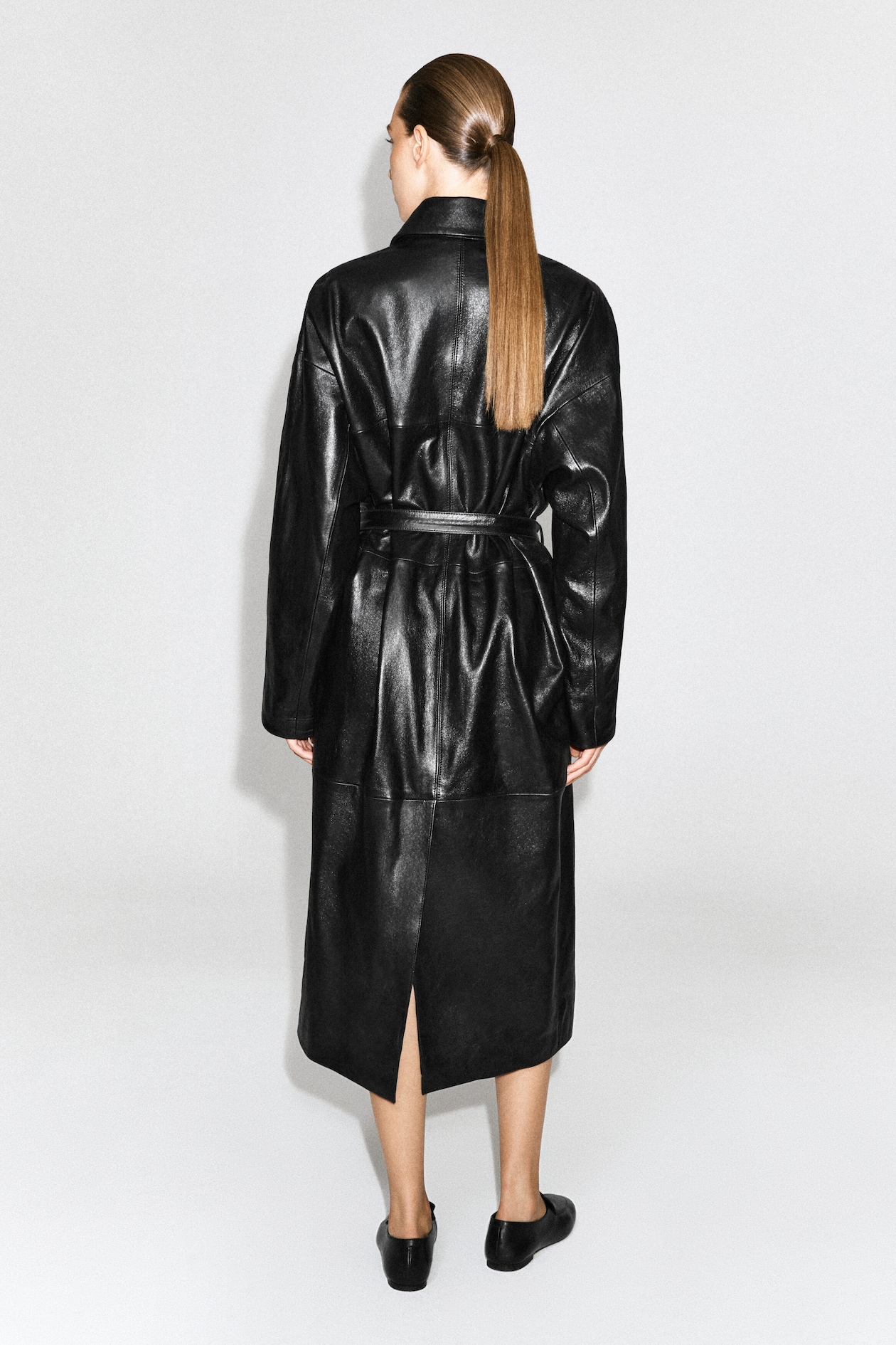 OVERSIZED BELTED LEATHER LONG COAT — BLACK
