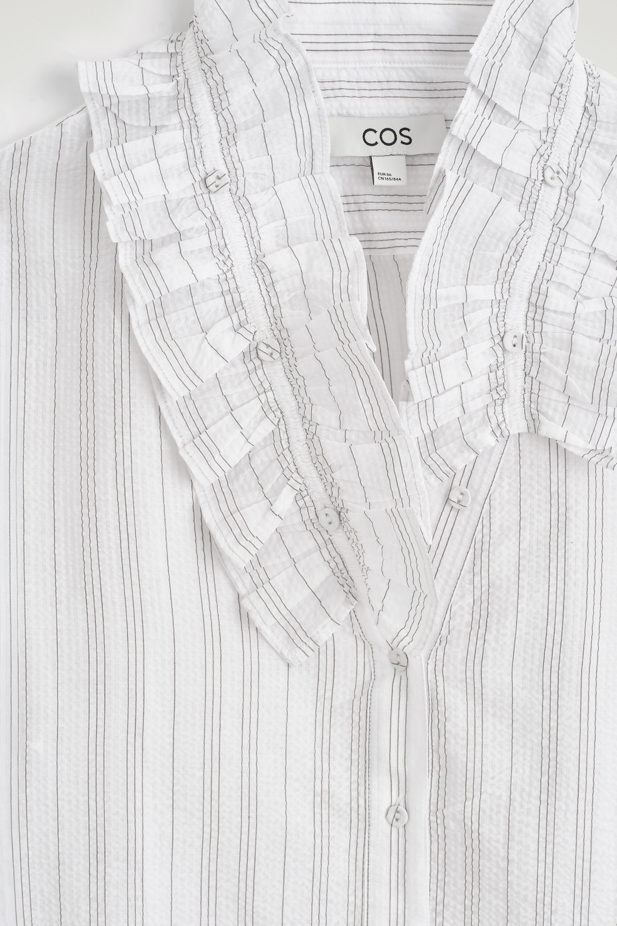 RUFFLE-COLLAR SEERSUCKER BLOUSE — WHITE / STRIPED