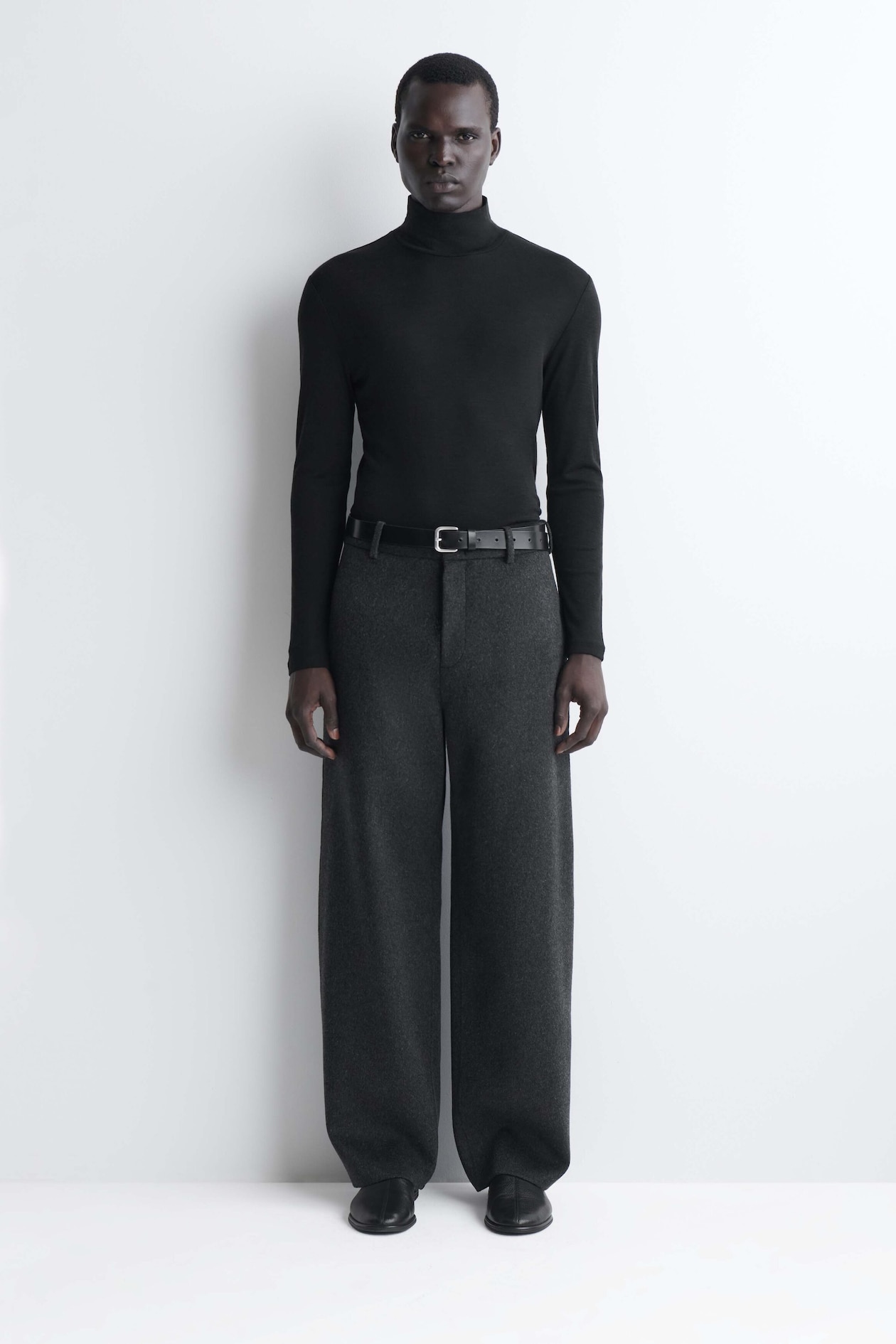SLIM WOOL-JERSEY ROLLNECK TOP — BLACK