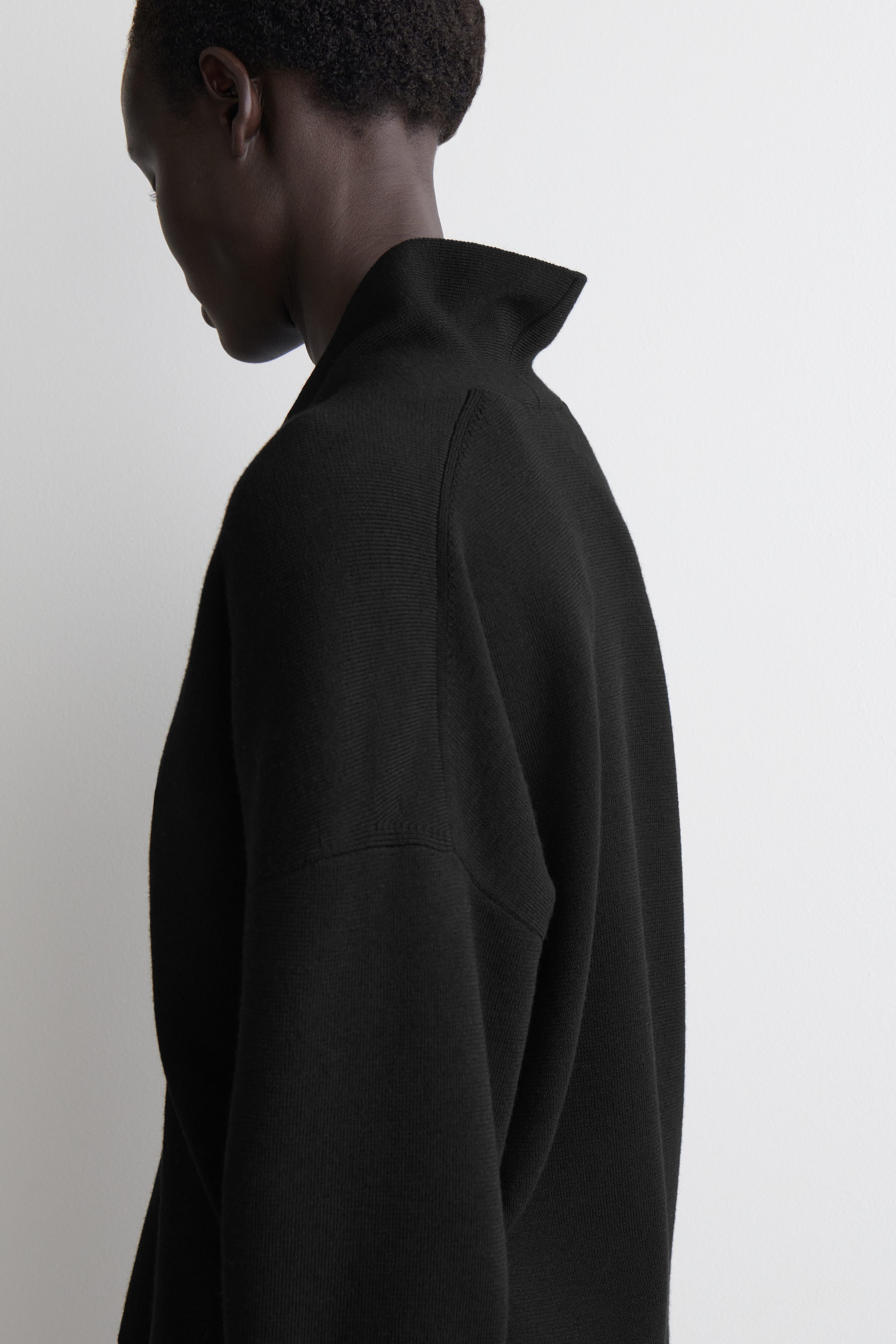 DRAPED MERINO WOOL V-NECK SWEATER
