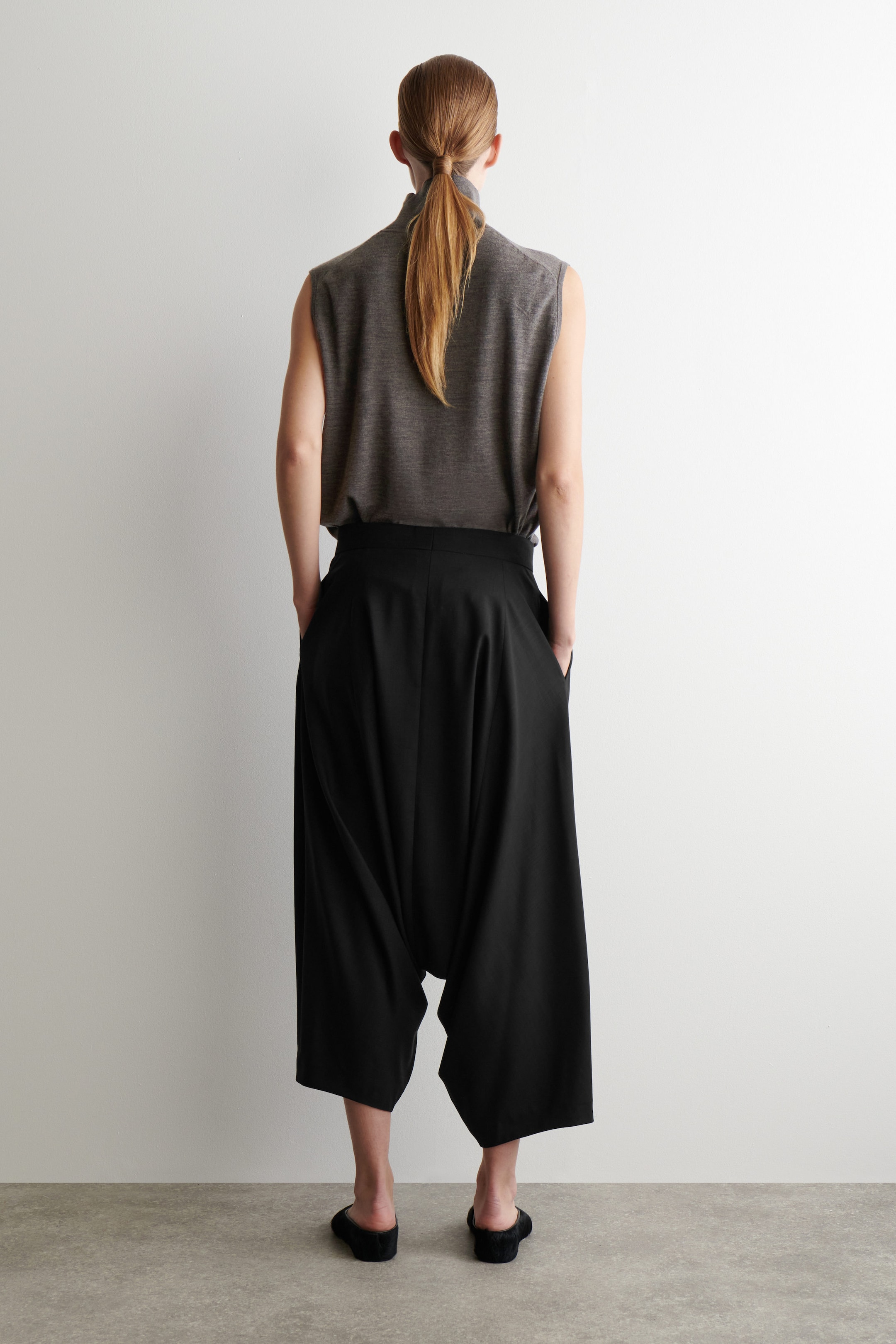 VOLUMINOUS WOOL TROUSERS