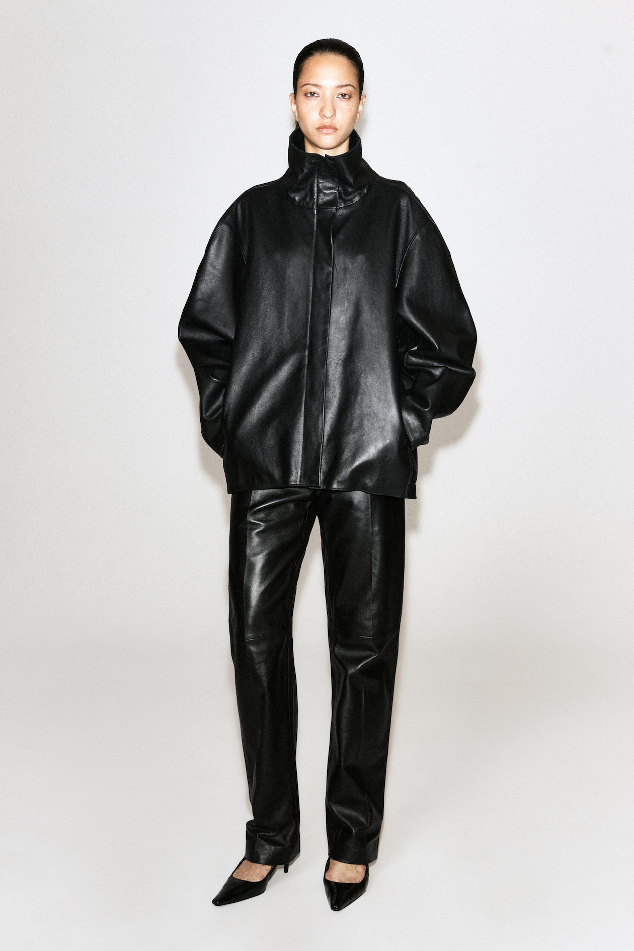 LEATHER FUNNEL-NECK JACKET — BLACK