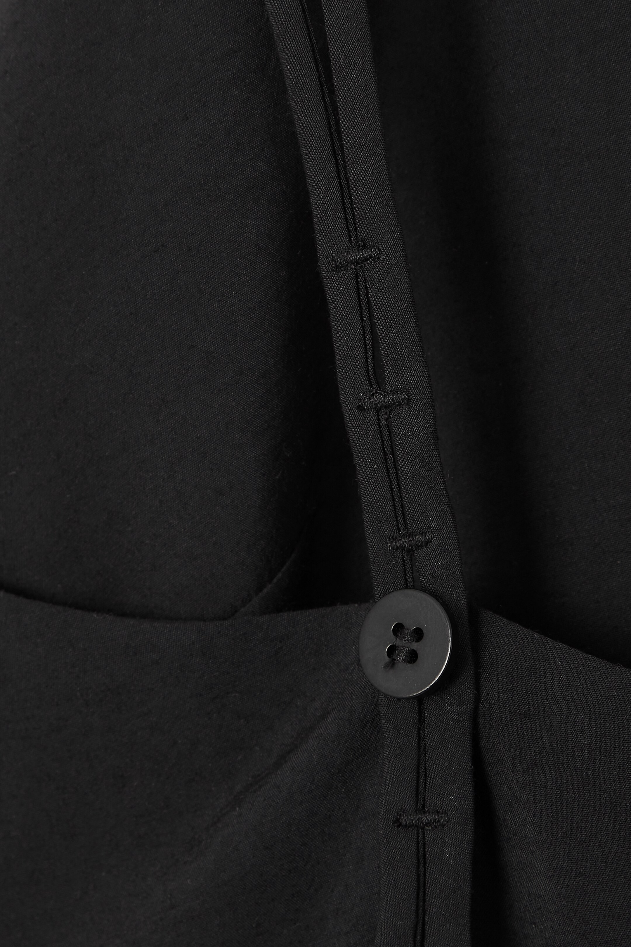 Grösseres Bild ansehen: JUMPSUIT MIT WEITEM BEIN UND V-AUSSCHNITT - SCHWARZ - DAMEN | H&M CH 2