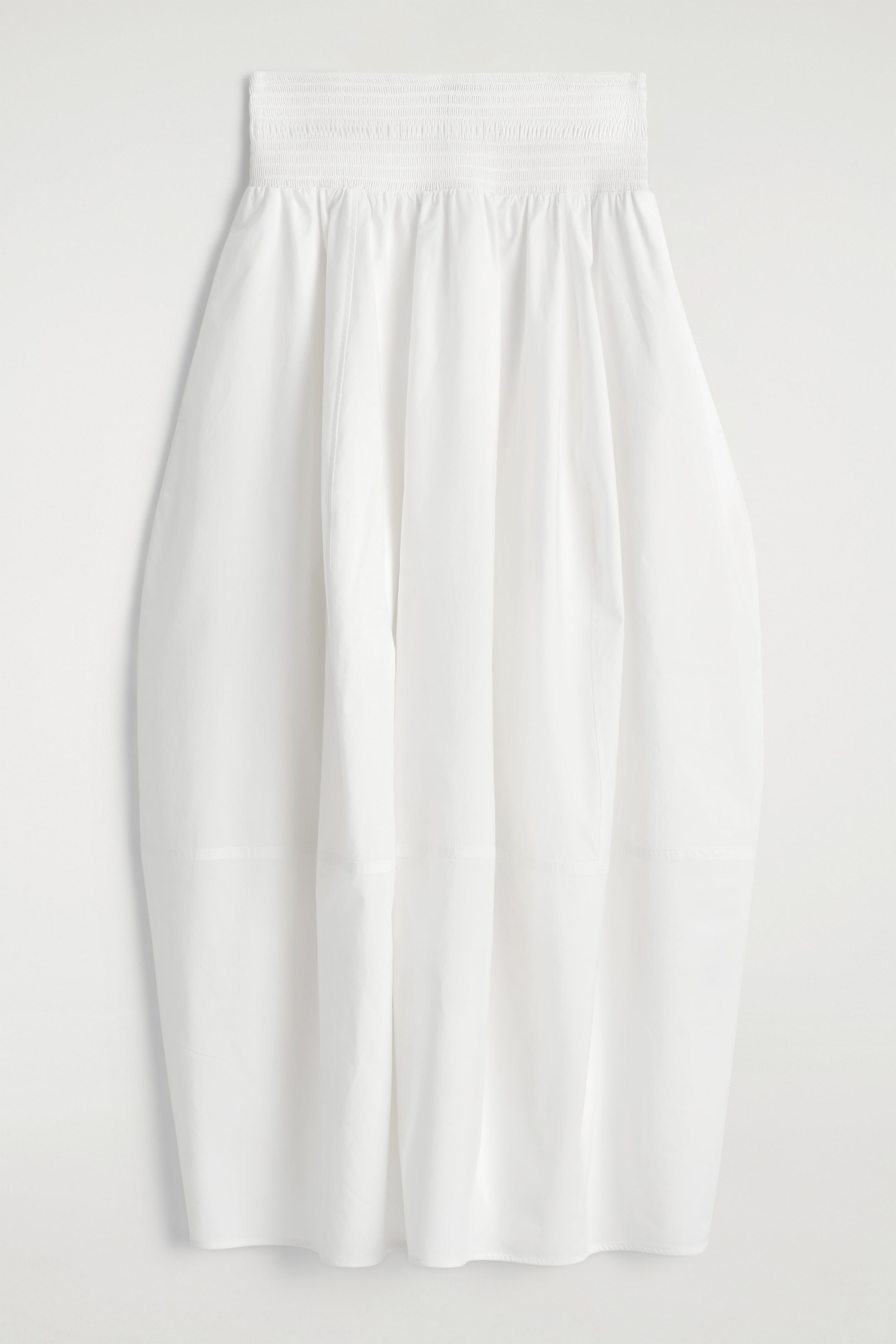 SMOCKED PANELED MIDI SKIRT