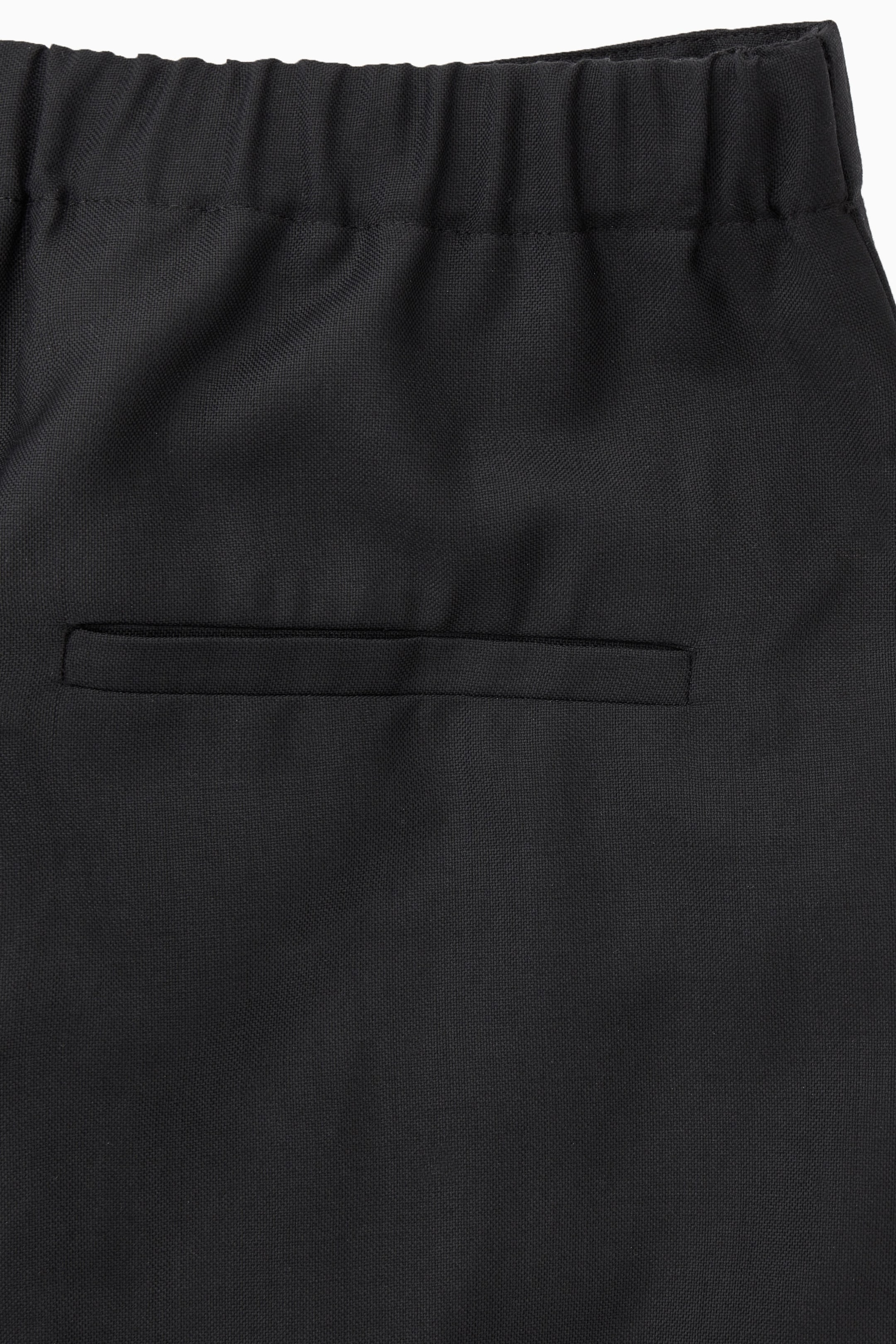 PLEATED WIDE-LEG WOOL PANTS