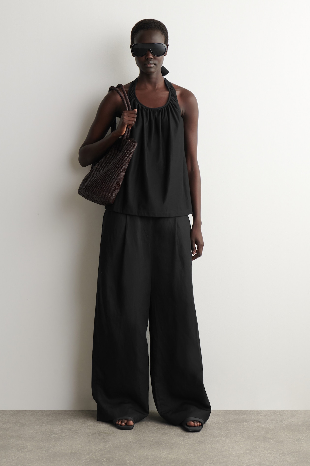 OPEN-BACK HALTERNECK TOP — BLACK