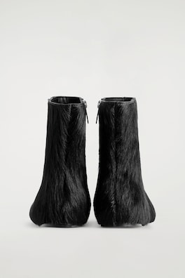PONY HAIR-EFFECT LEATHER SOCK BOOTS — CARBON 2