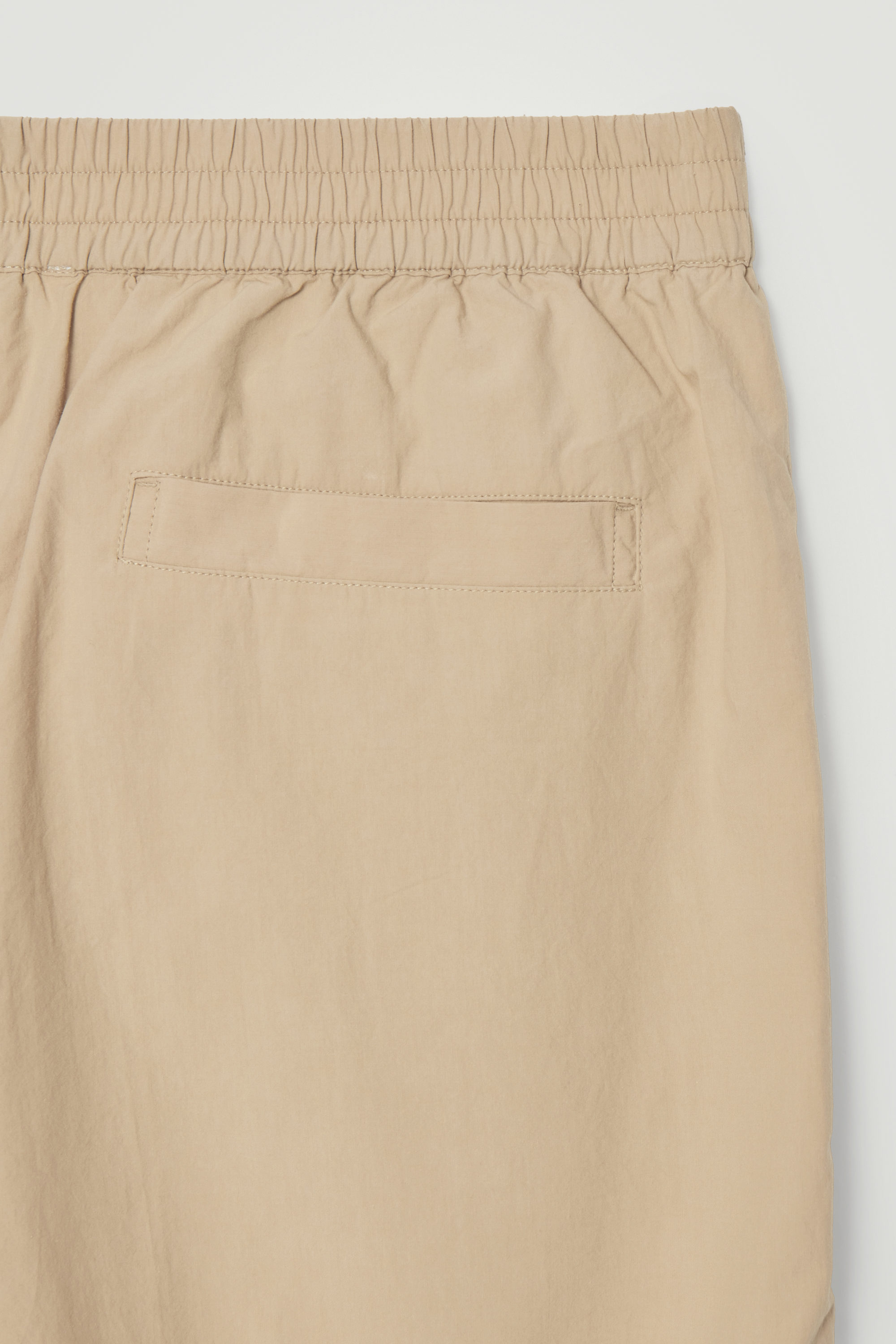 ELASTICATED COTTON SHORTS - BEIGE | COS