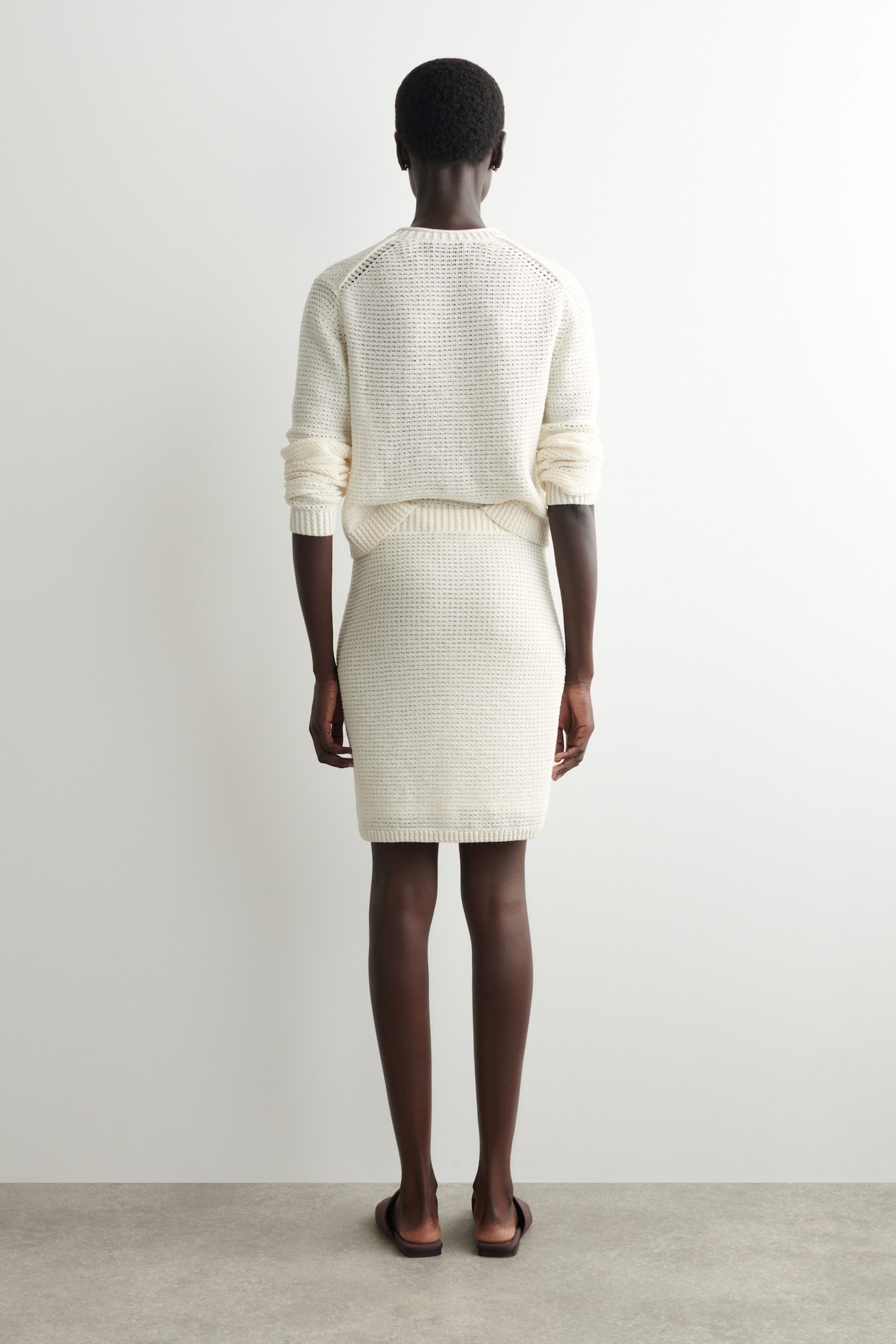 TEXTURED KNITTED COTTON MINISKIRT — WHITE