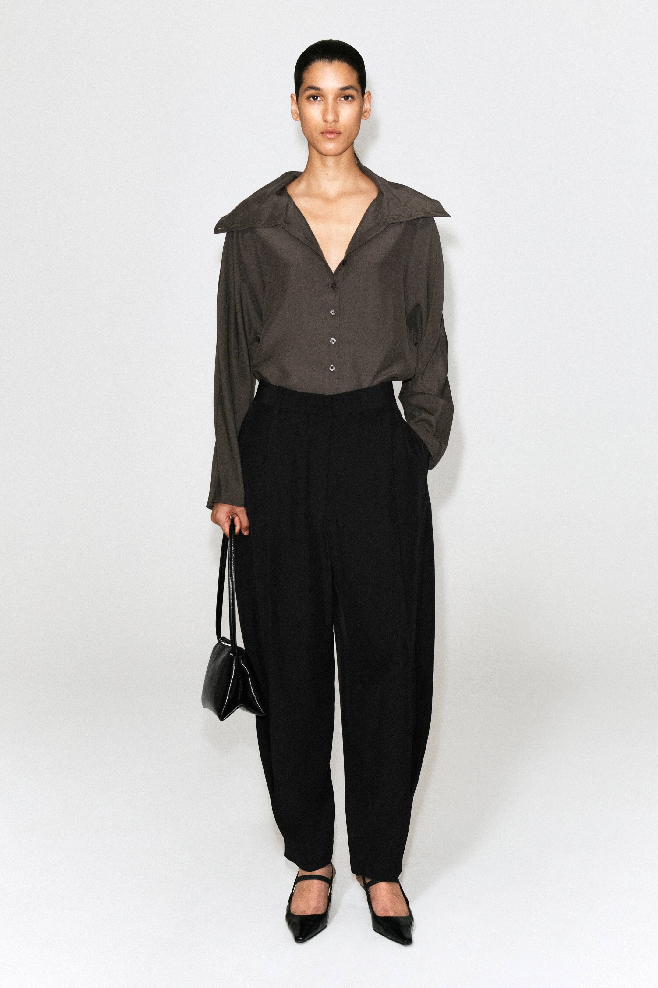 הצגת תמונה גדולה יותר: PLEATED BALLOON-LEG TROUSERS - שחור - Ladies | H&M IL 1