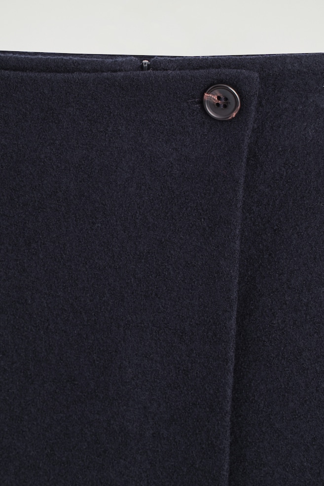 BOILED MERINO WOOL MINI SKIRT — NAVY