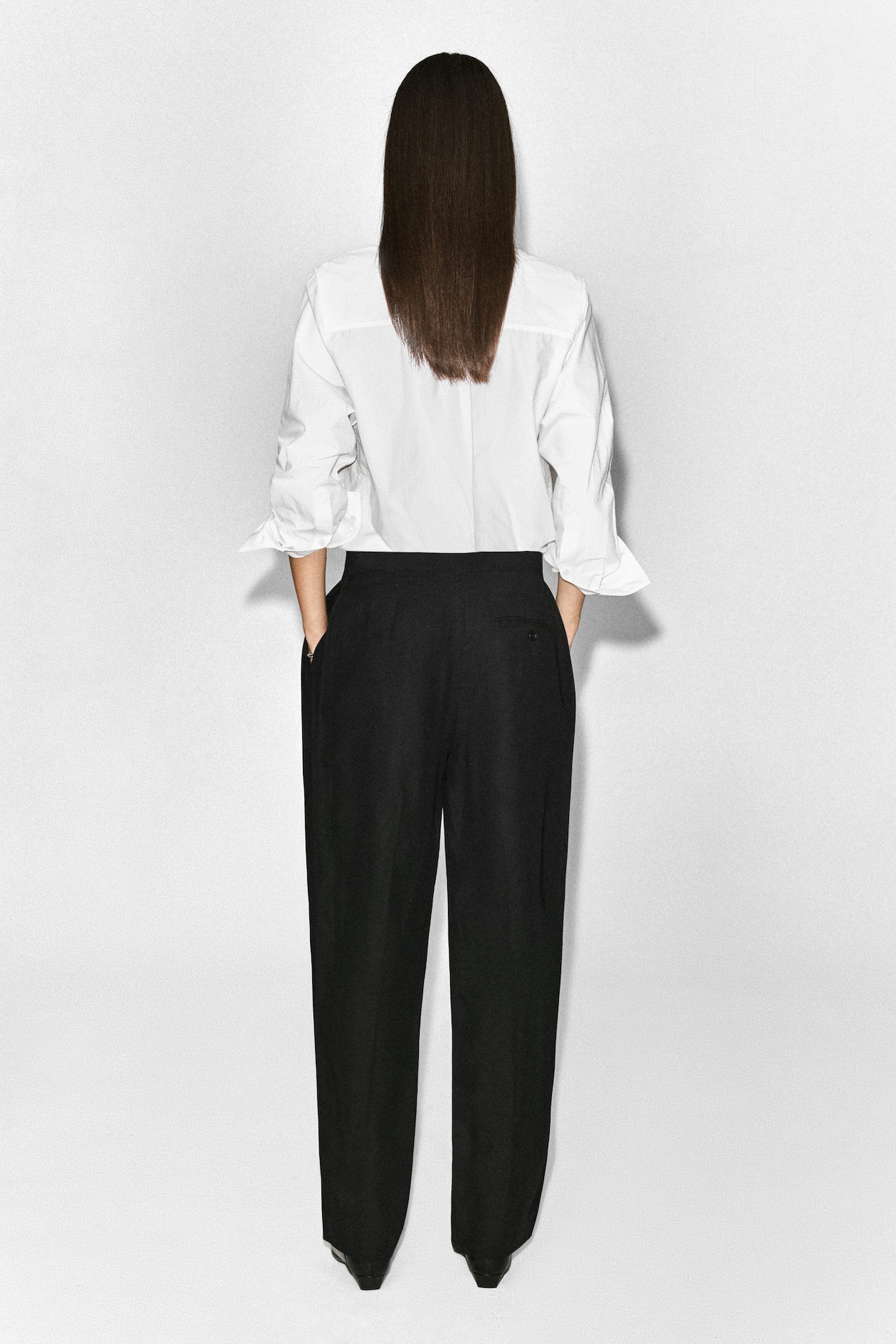 PLEATED-PANEL STRAIGHT-LEG PANTS — BLACK