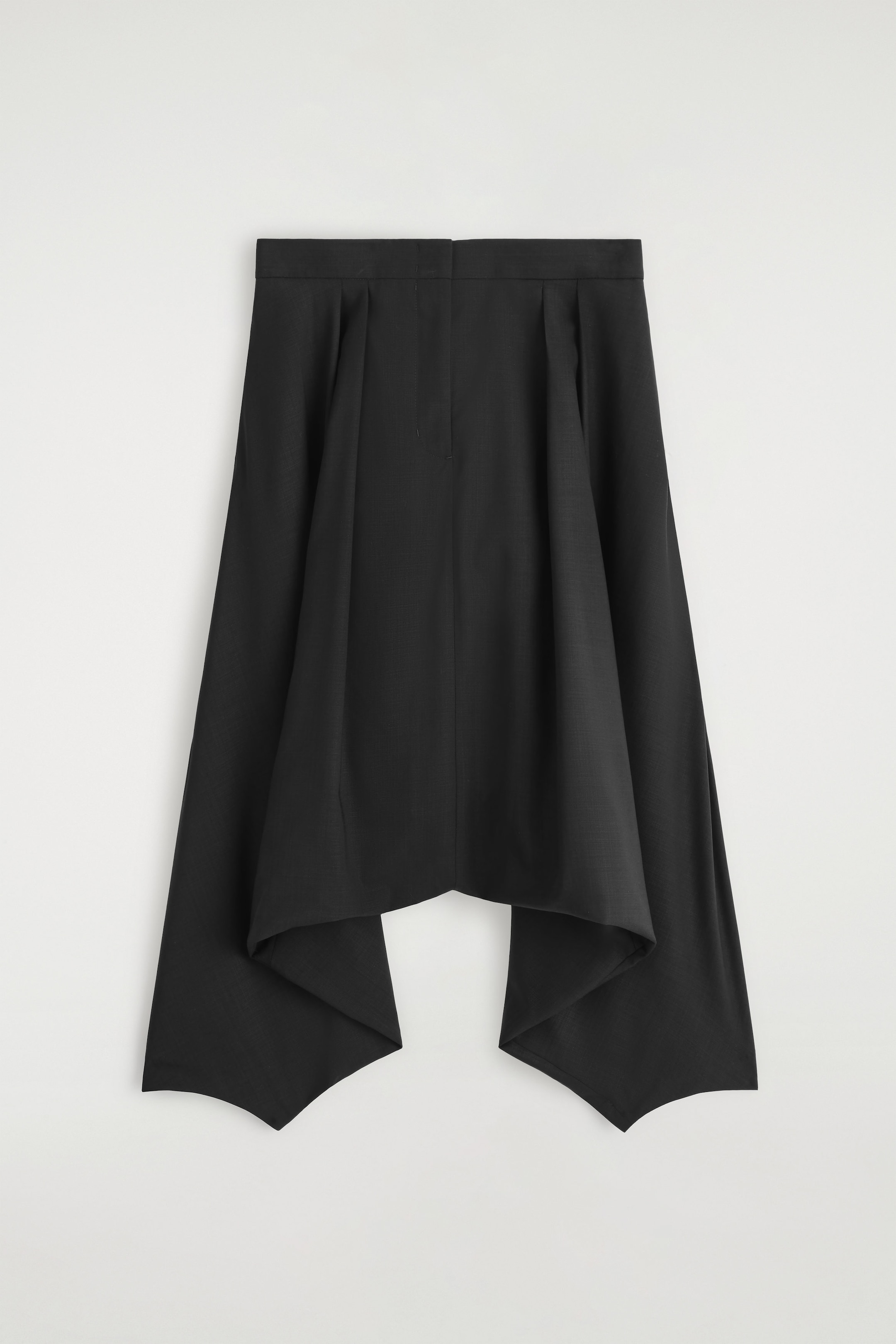 VOLUMINOUS WOOL TROUSERS