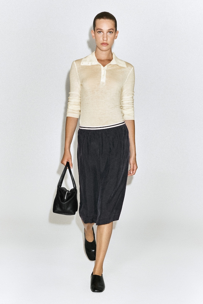 CONTRAST-PANEL PENCIL SKIRT — BLACK