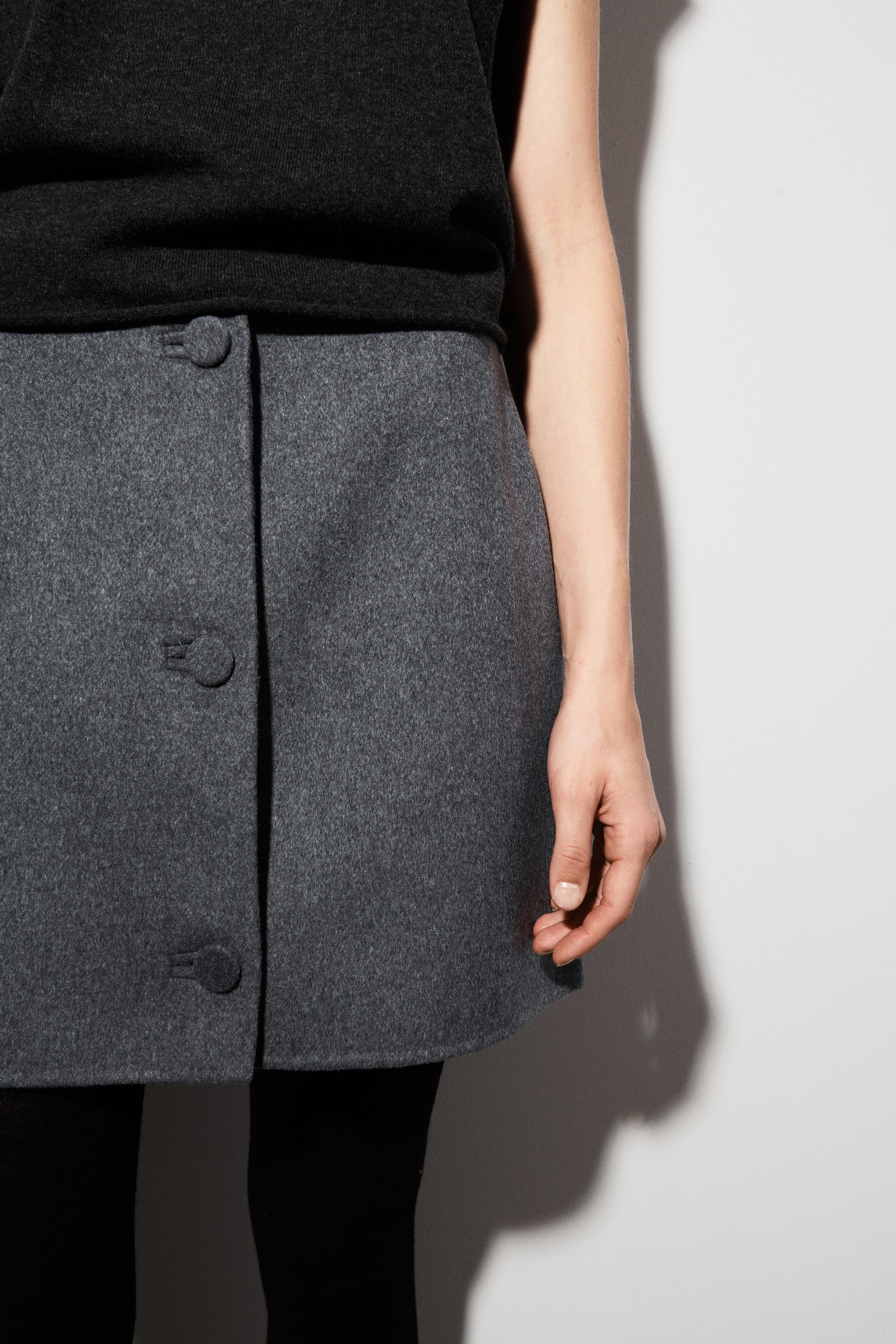 BUTTONED DOUBLE-FACED WOOL MINI SKIRT
