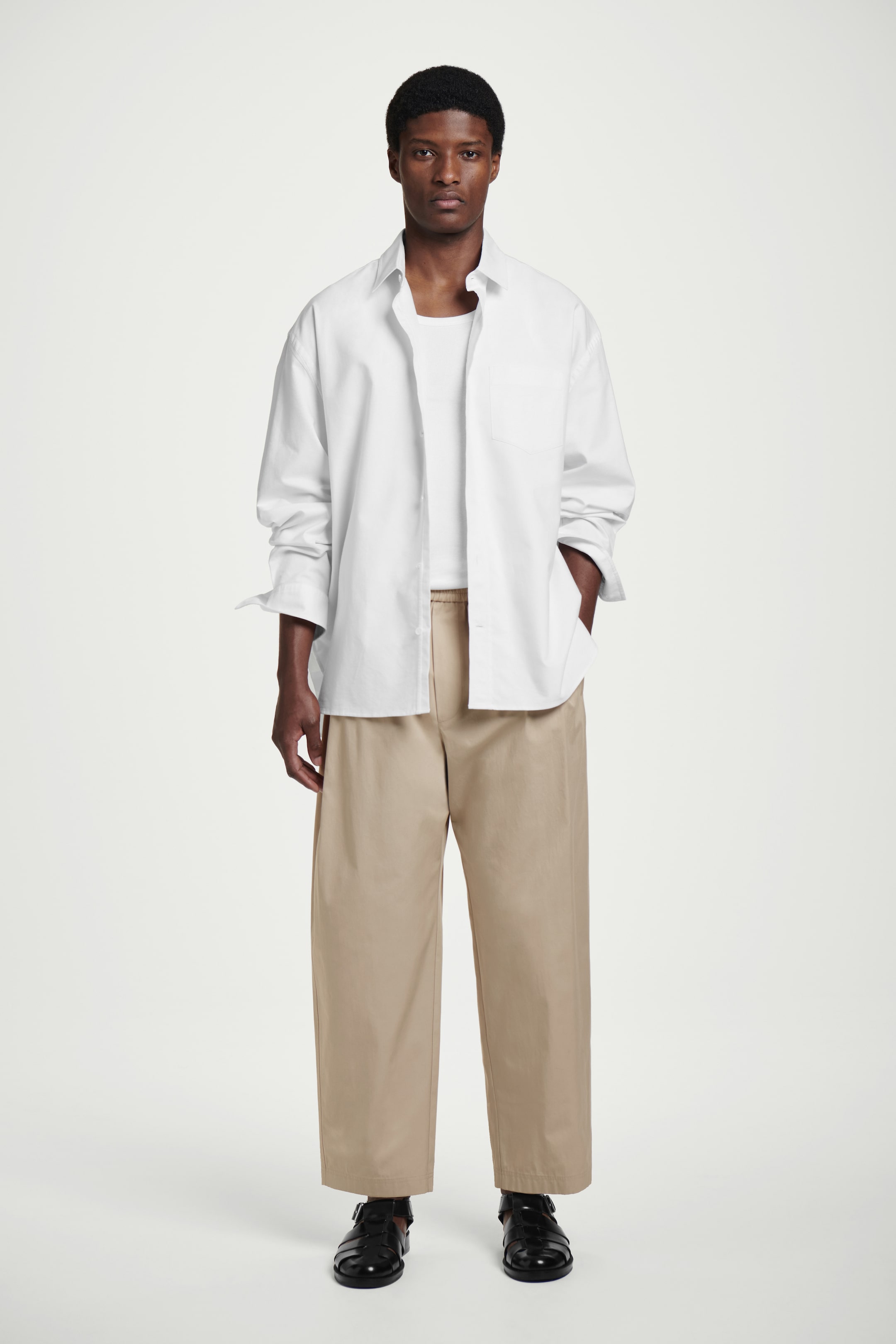 Visualizza immagine più grande: PANTALONI CROPPED ELASTICIZZATI A GAMBA LARGA - TALPA - UOMO | H&M IT 1