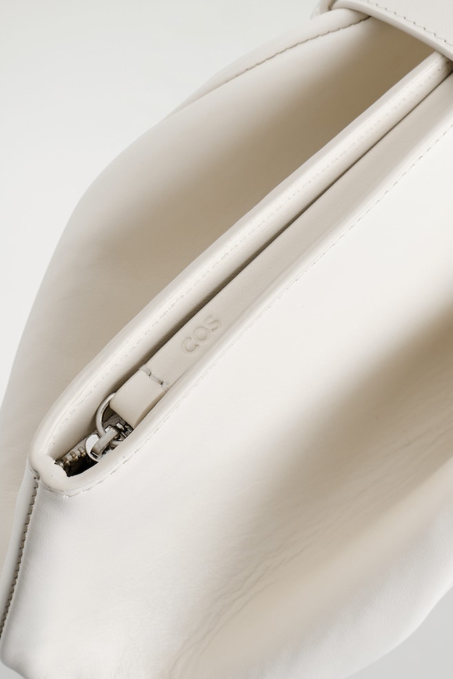 BELTED CLUTCH BAG - LEATHER — CHALK