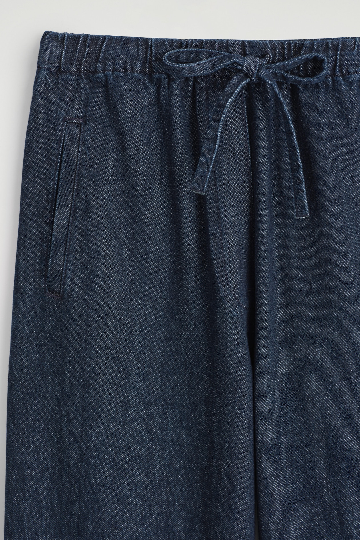 CROPPED DENIM WIDE-LEG TROUSERS — DARK BLUE