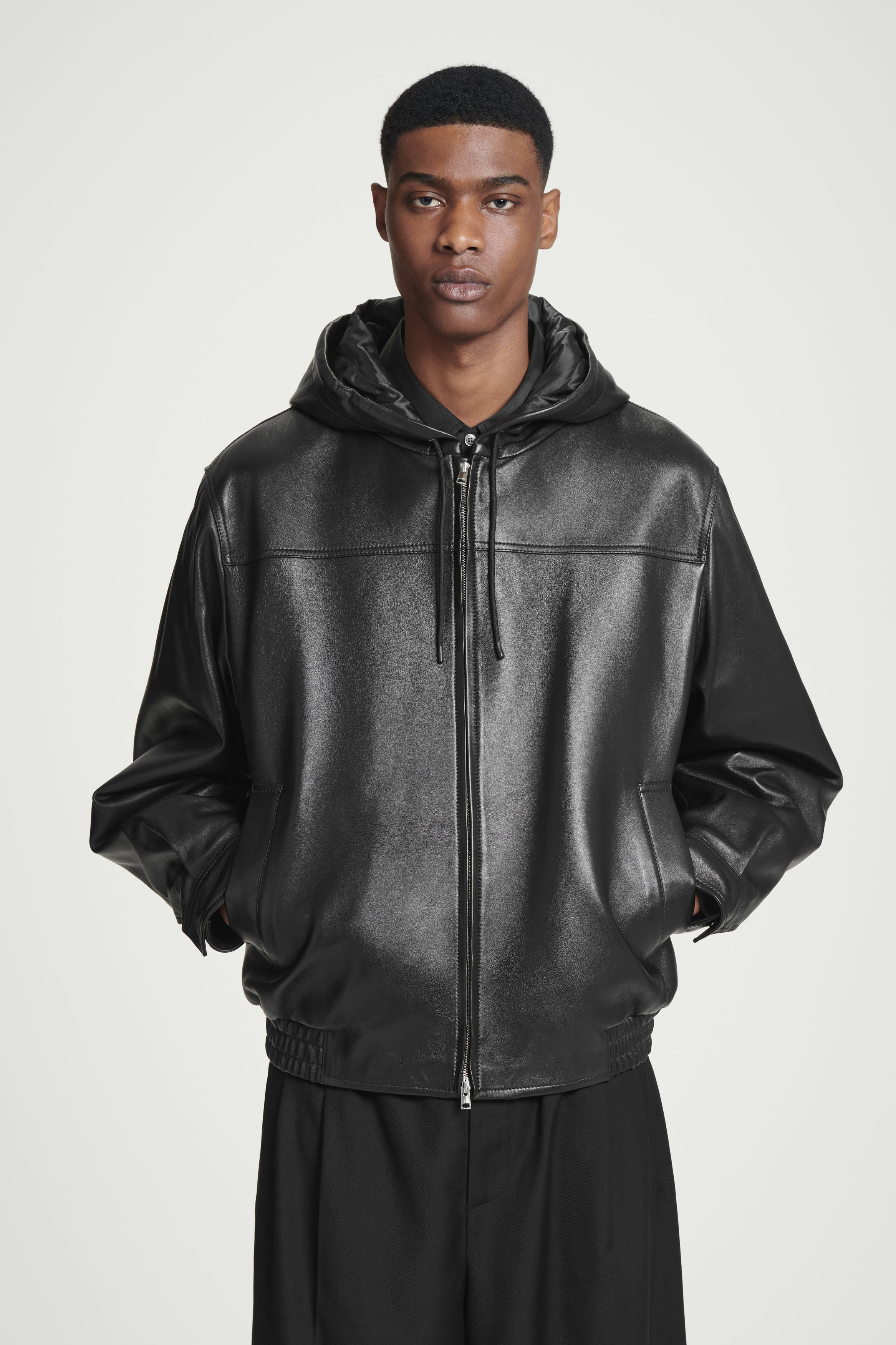 HOODED LEATHER BOMBER JACKET - BLACK | COS
