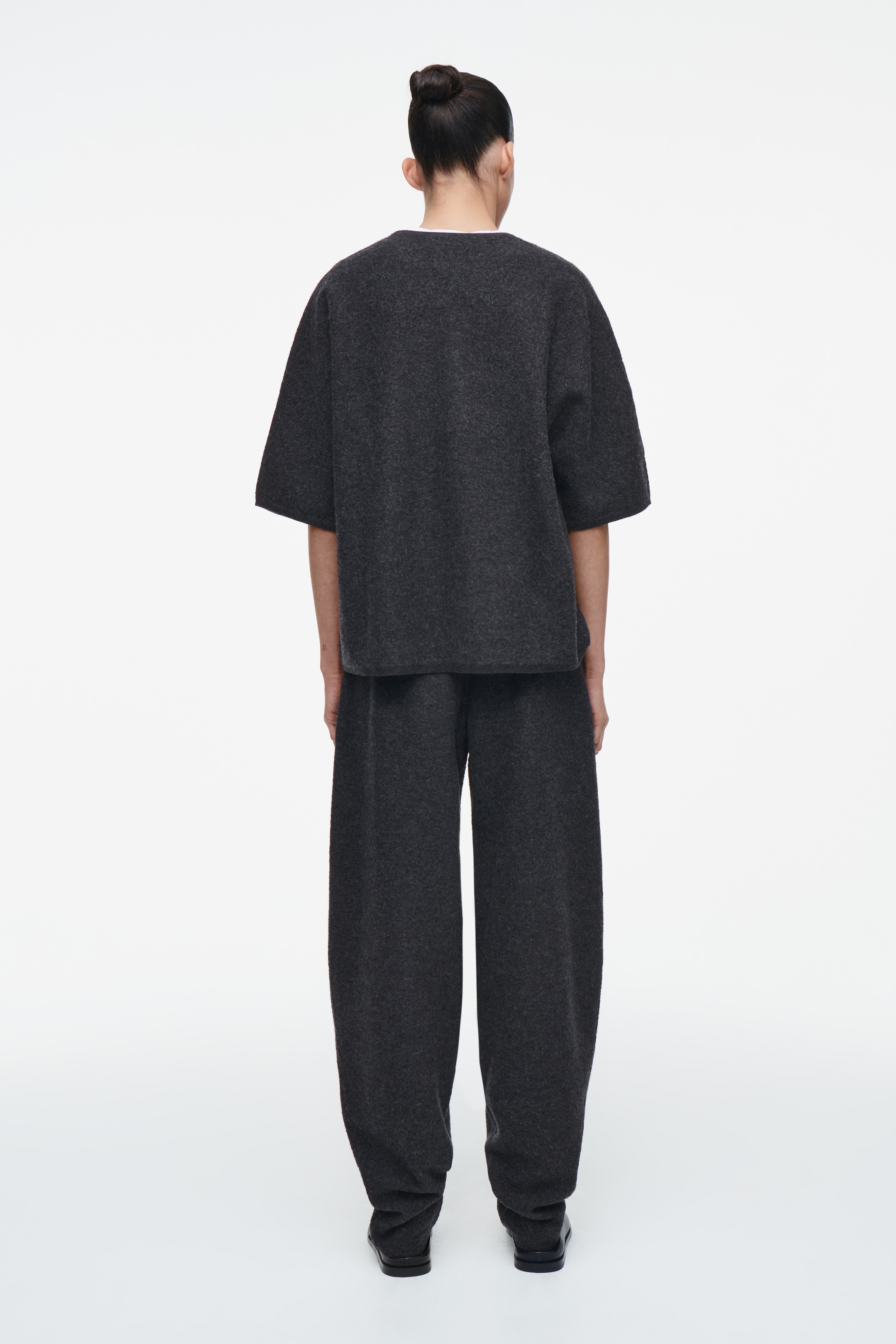 Ver imagen más grande: PANTALONES DE LANA MERINO HERVIDA - GRIS MARENGO JASPEADO - MUJER | H&M ES 3