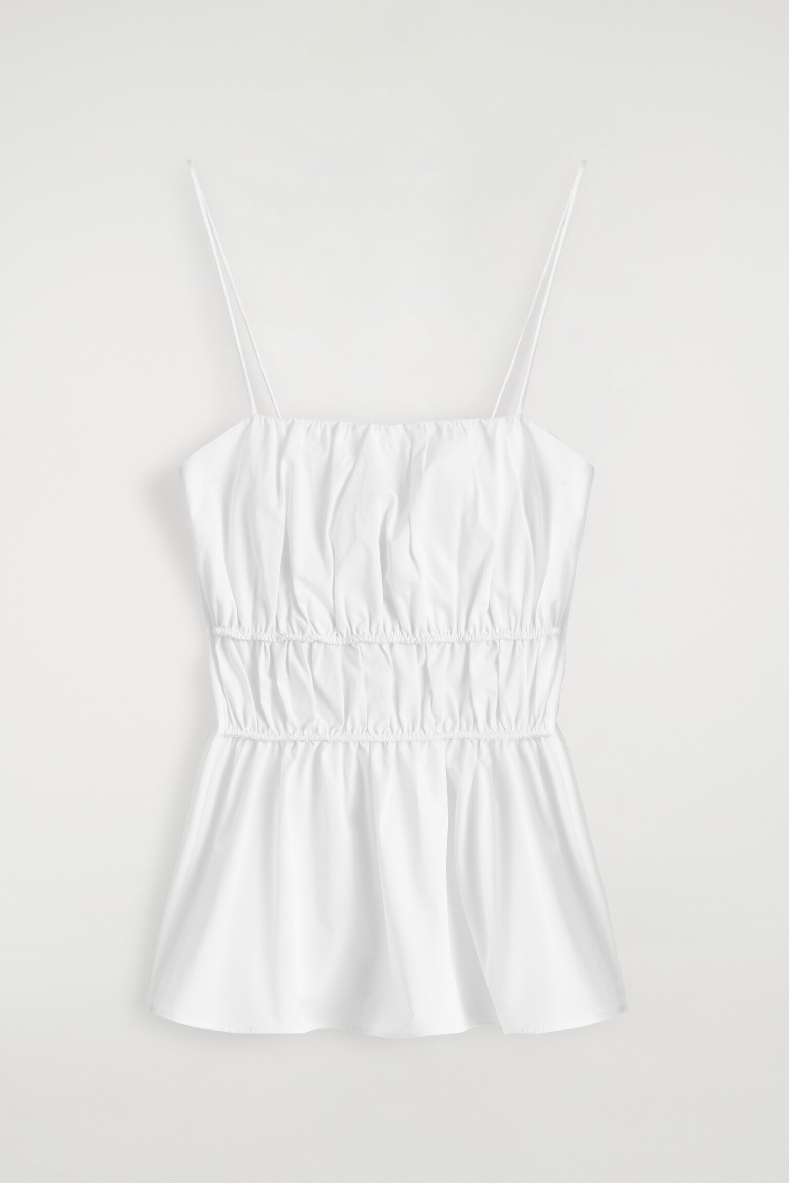 TOP FRUNCIDO CON PEPLUM DE ALGODÓN - BLANCO - 2