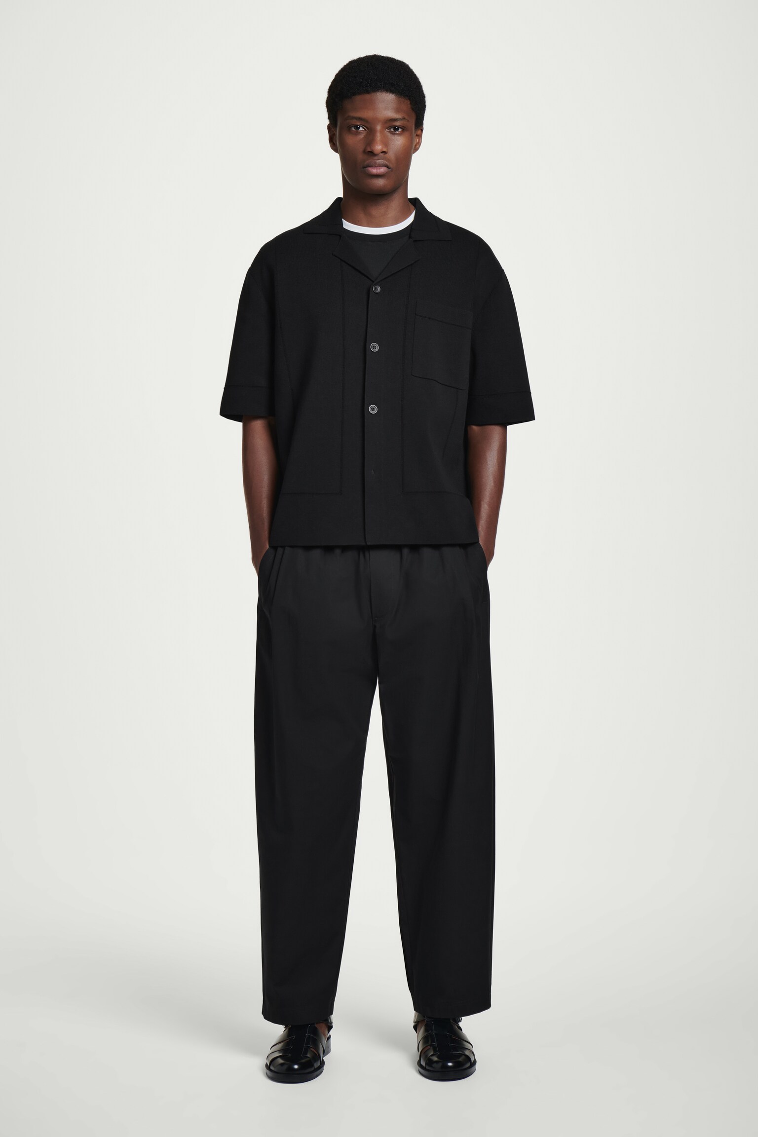 PANTALONI CROPPED ELASTICIZZATI A GAMBA LARGA - NERO/TALPA - 1