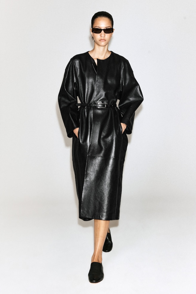PANELED LEATHER LONG COAT — BLACK