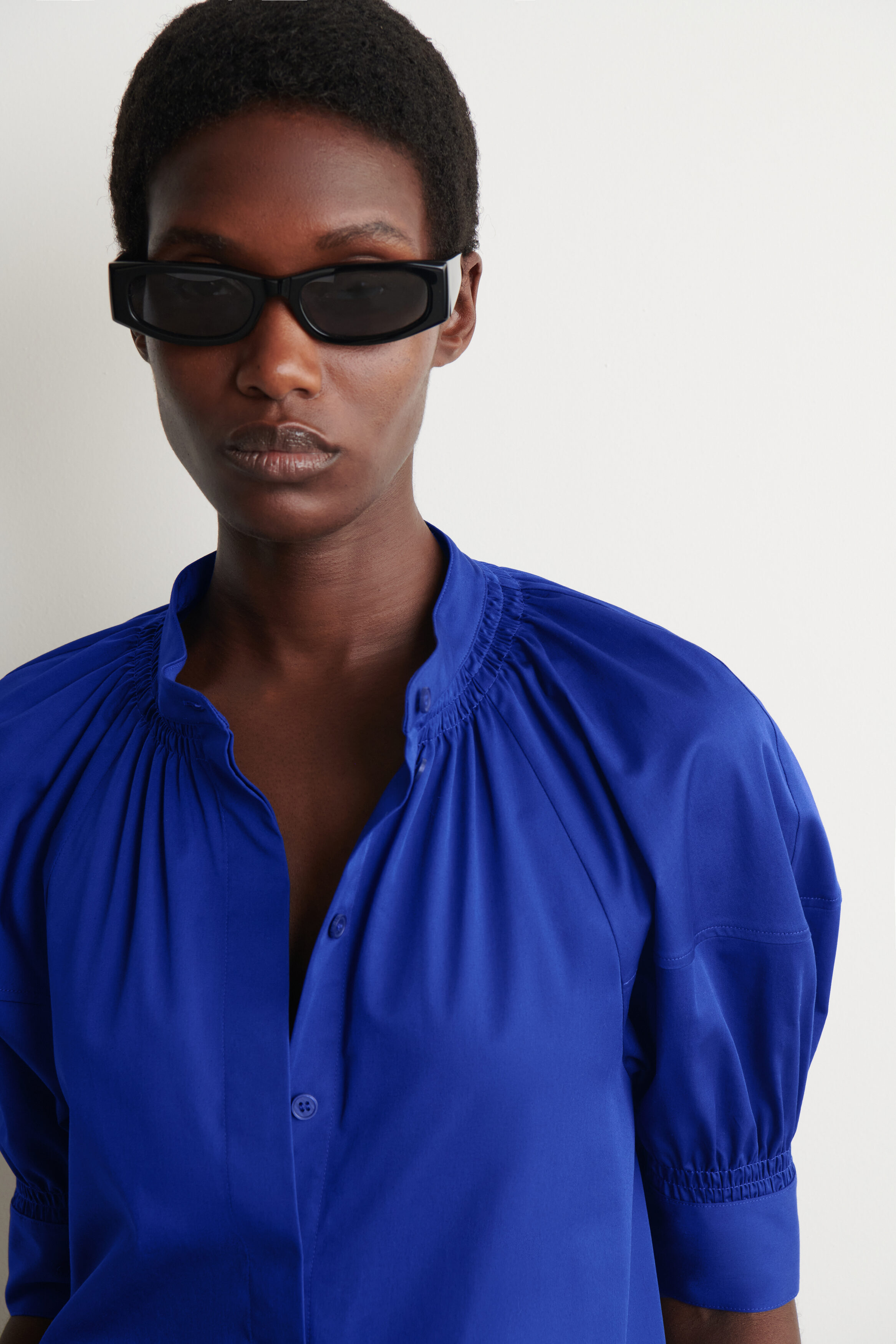 SMOCKED PUFF-SLEEVE BLOUSE - BLUE | COS NL