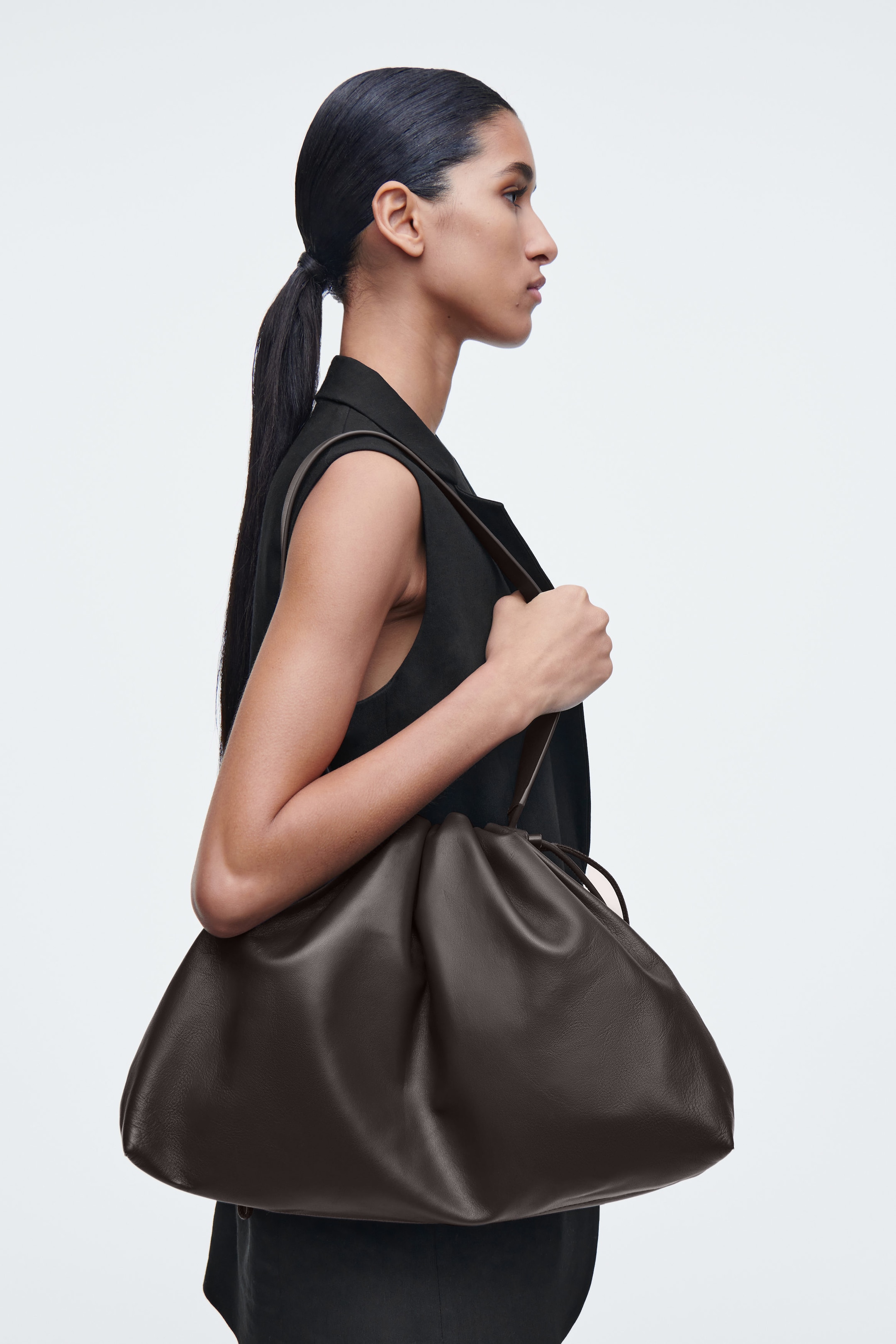 CAVATELLI CLUTCH BAG - LEATHER