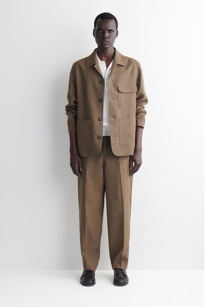 PANTALÓN LINO TAPERED LEG RELAXED FIT - CAQUI OSCURO - 1