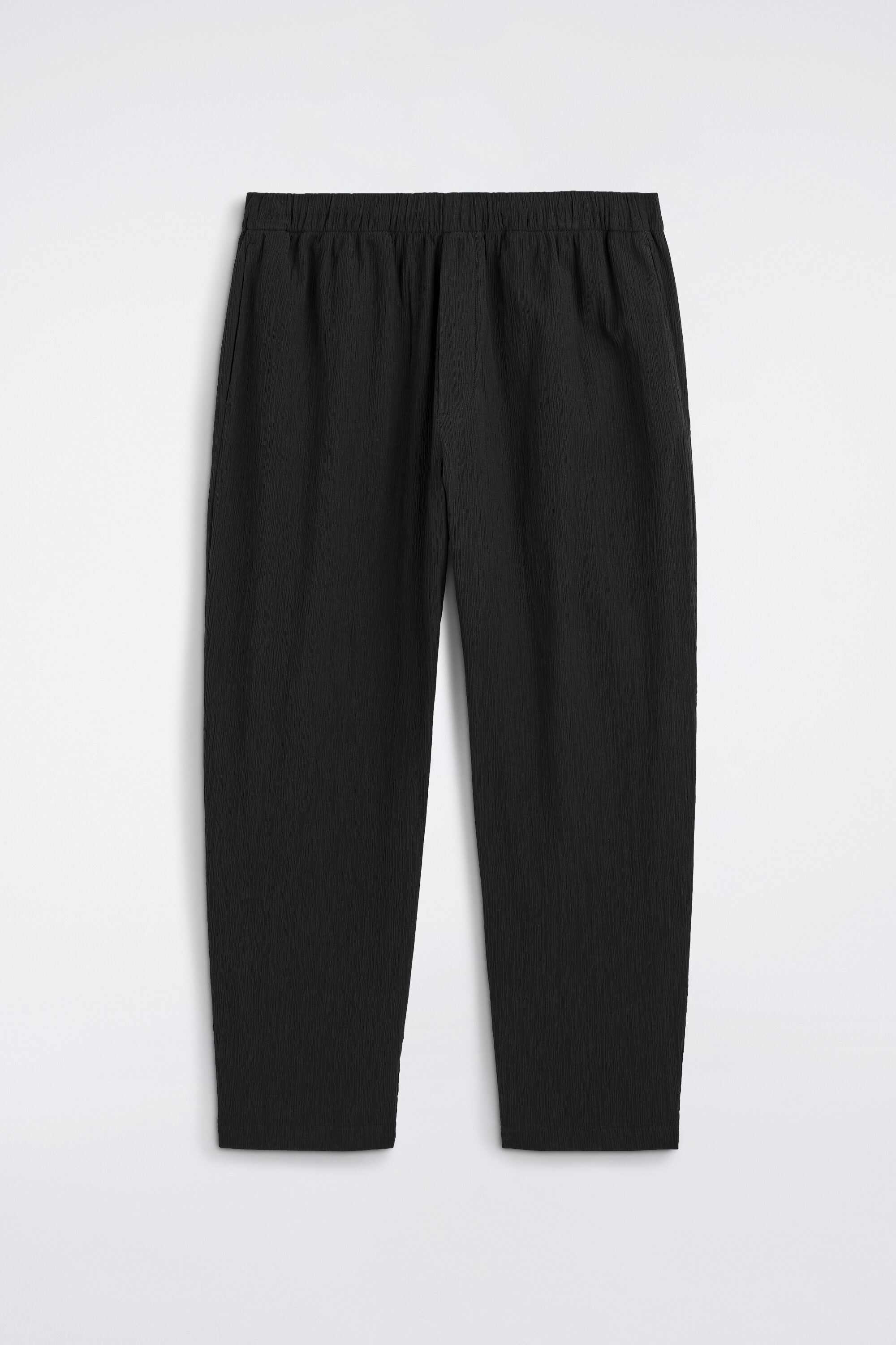 CRINKLED-COTTON RELAXED-FIT TAPERED PANTS - BLACK | COS US