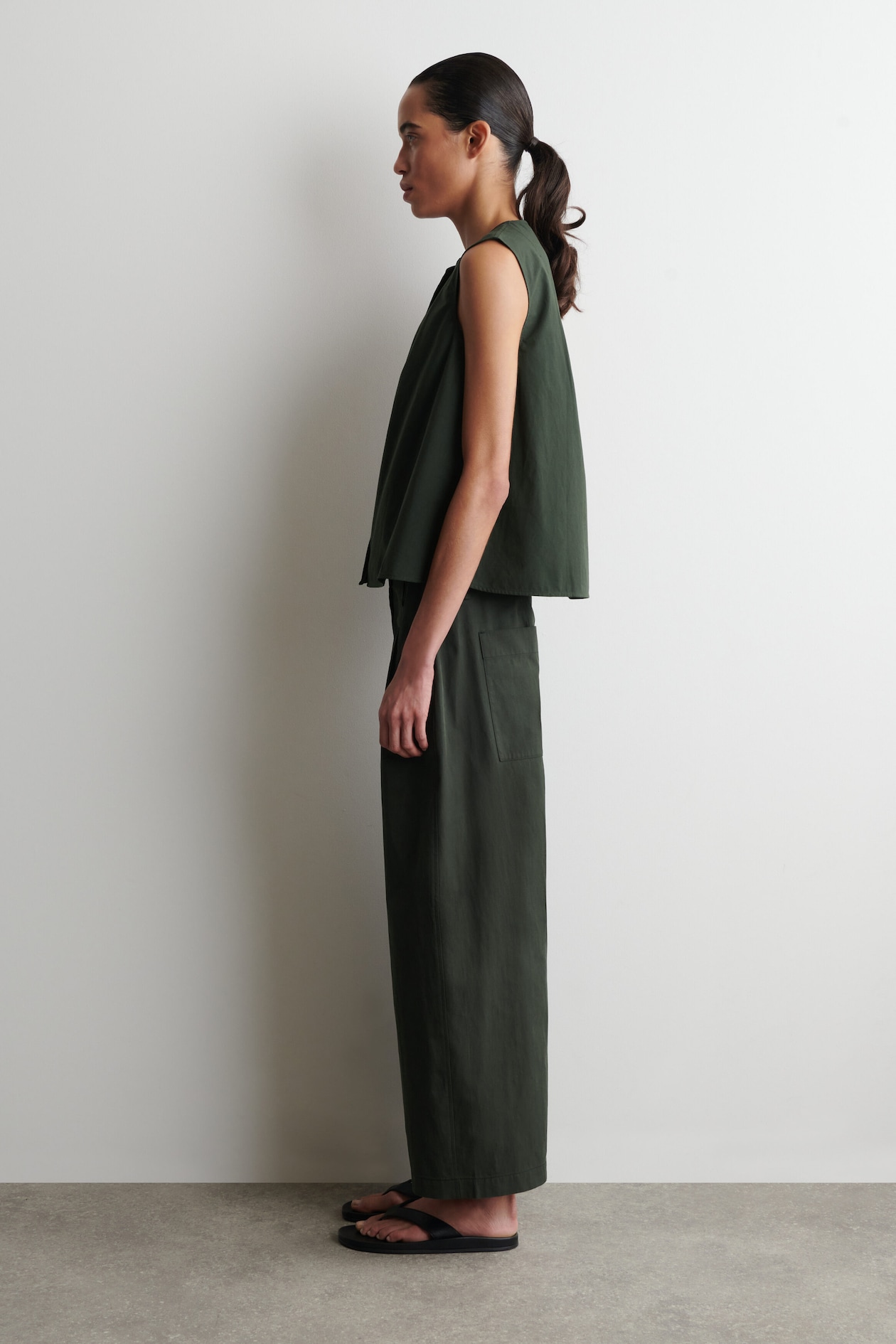 PLEATED SLEEVELESS TOP — DARK GREEN