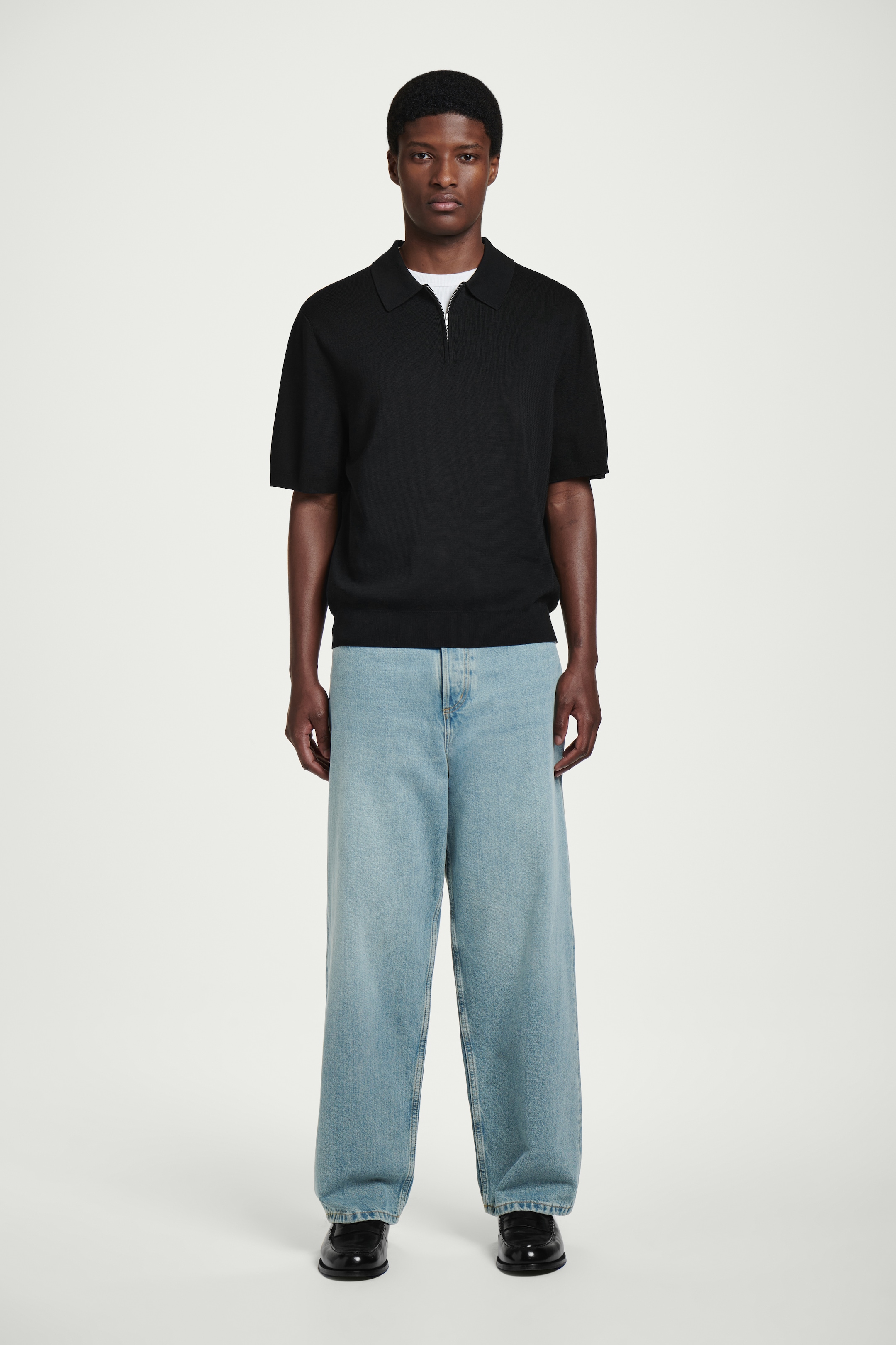 Visualizza immagine più grande: POLO IN MAGLIA CON MEZZA CERNIERA TAGLIO REGOLARE - NERO - UOMO | H&M IT 2