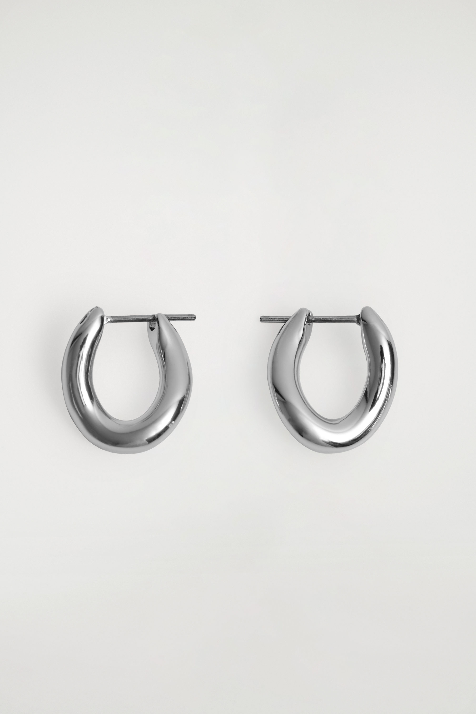 TWISTED HOOP EARRINGS - SILVER | COS