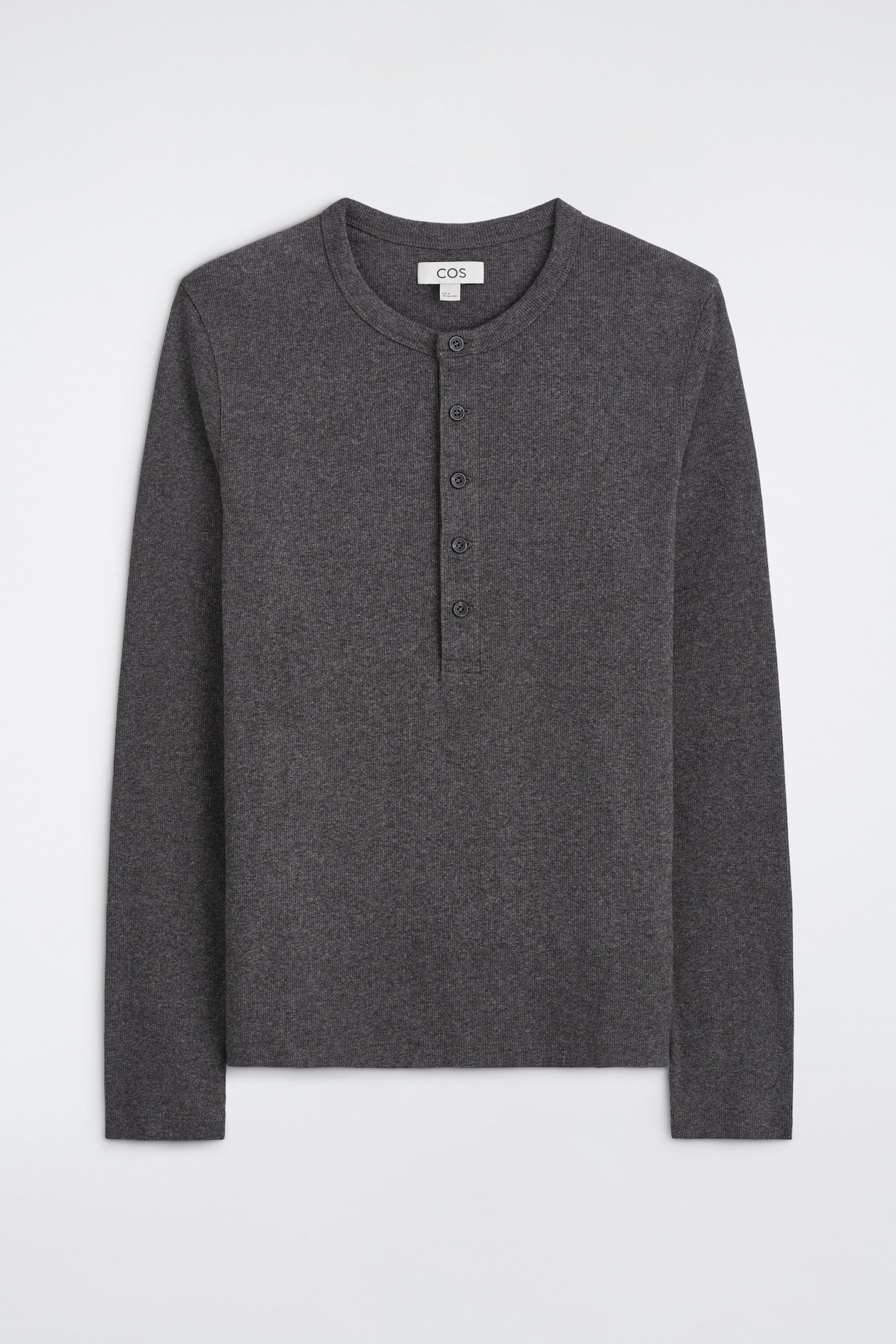 A dark grey, slim-fit, ribbed cotton long-sleeved Henley T-shirt is shown from the front, featuring a round neckline and a five-button placket. The garment features a fine ribbed texture across the body and long sleeves.