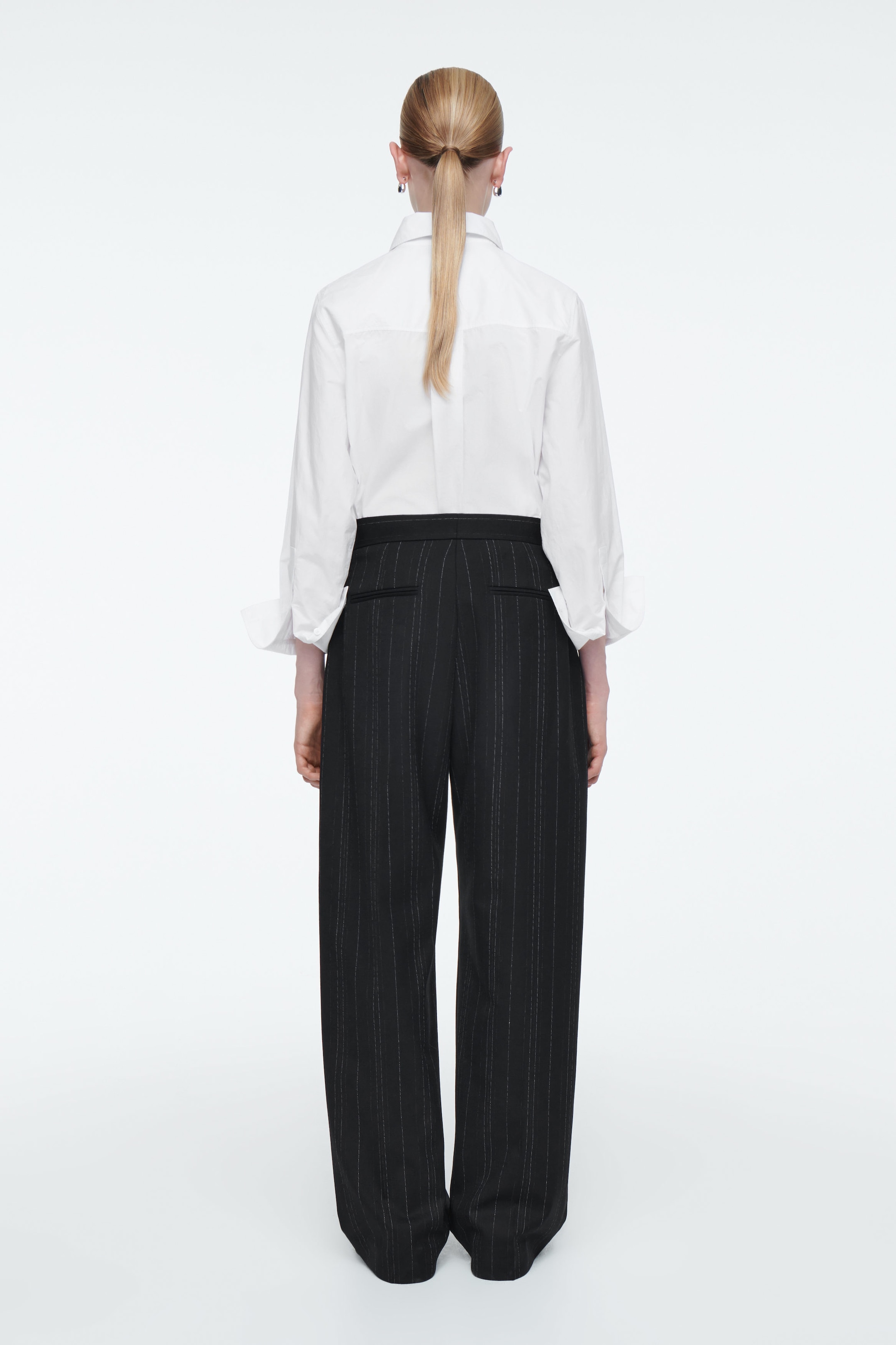 RELAXED PINSTRIPED BARREL-LEG TROUSERS