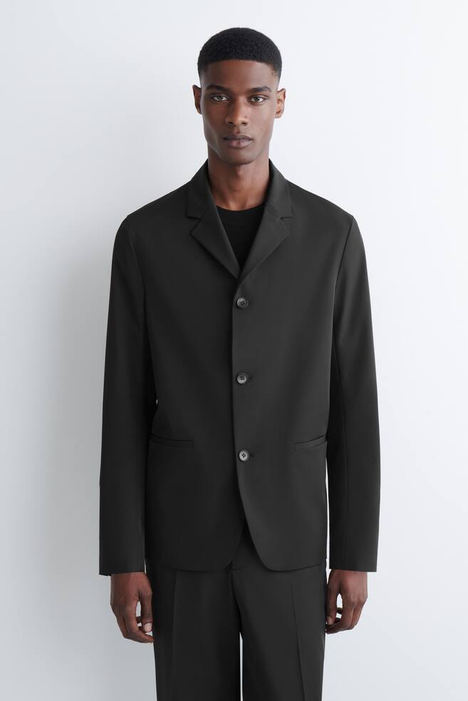 BLAZER DESESTRUCTURADA TWILL TÉCNICO SLIM FIT - NEGRO - 1