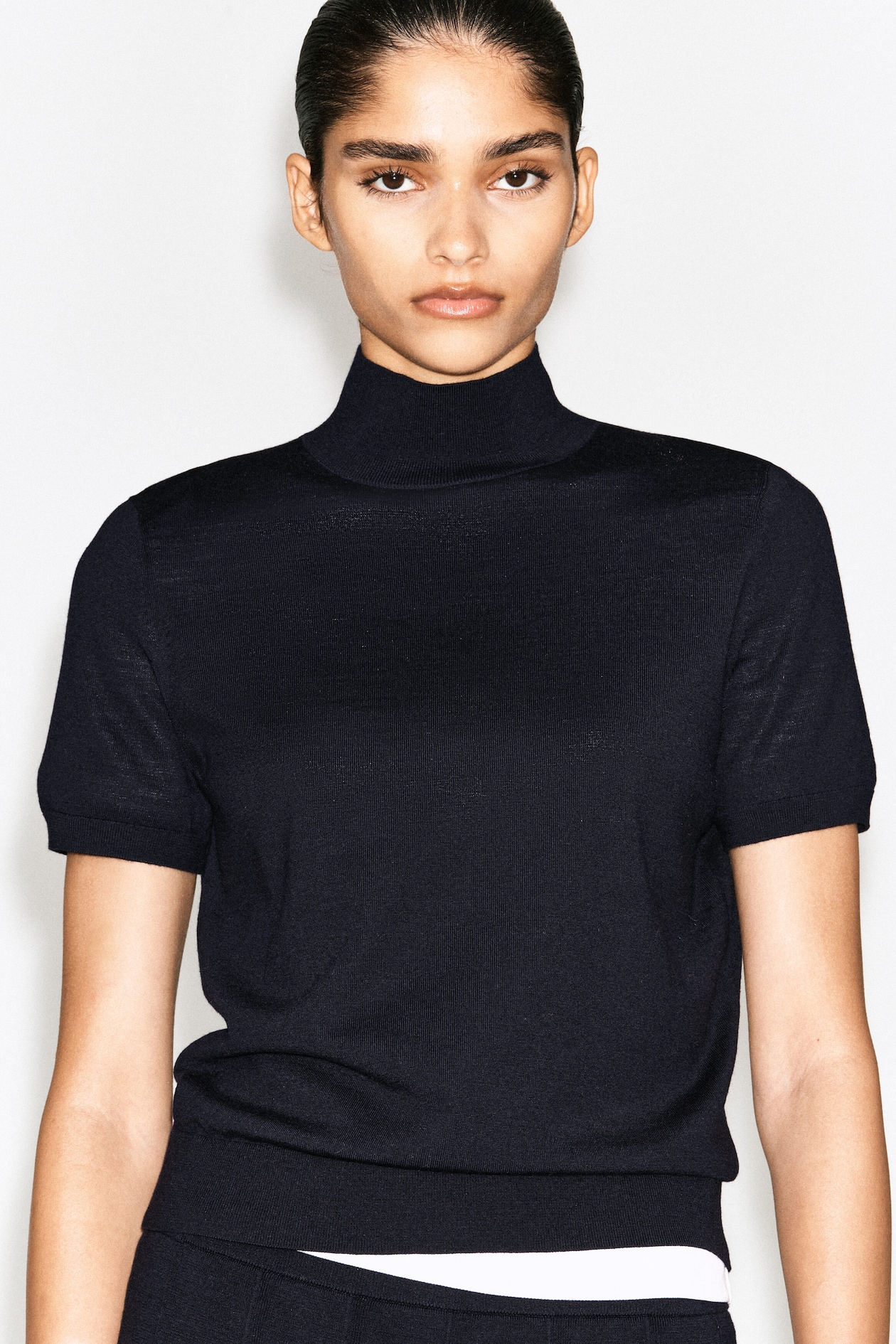 MERINO WOOL TURTLENECK TOP — NAVY