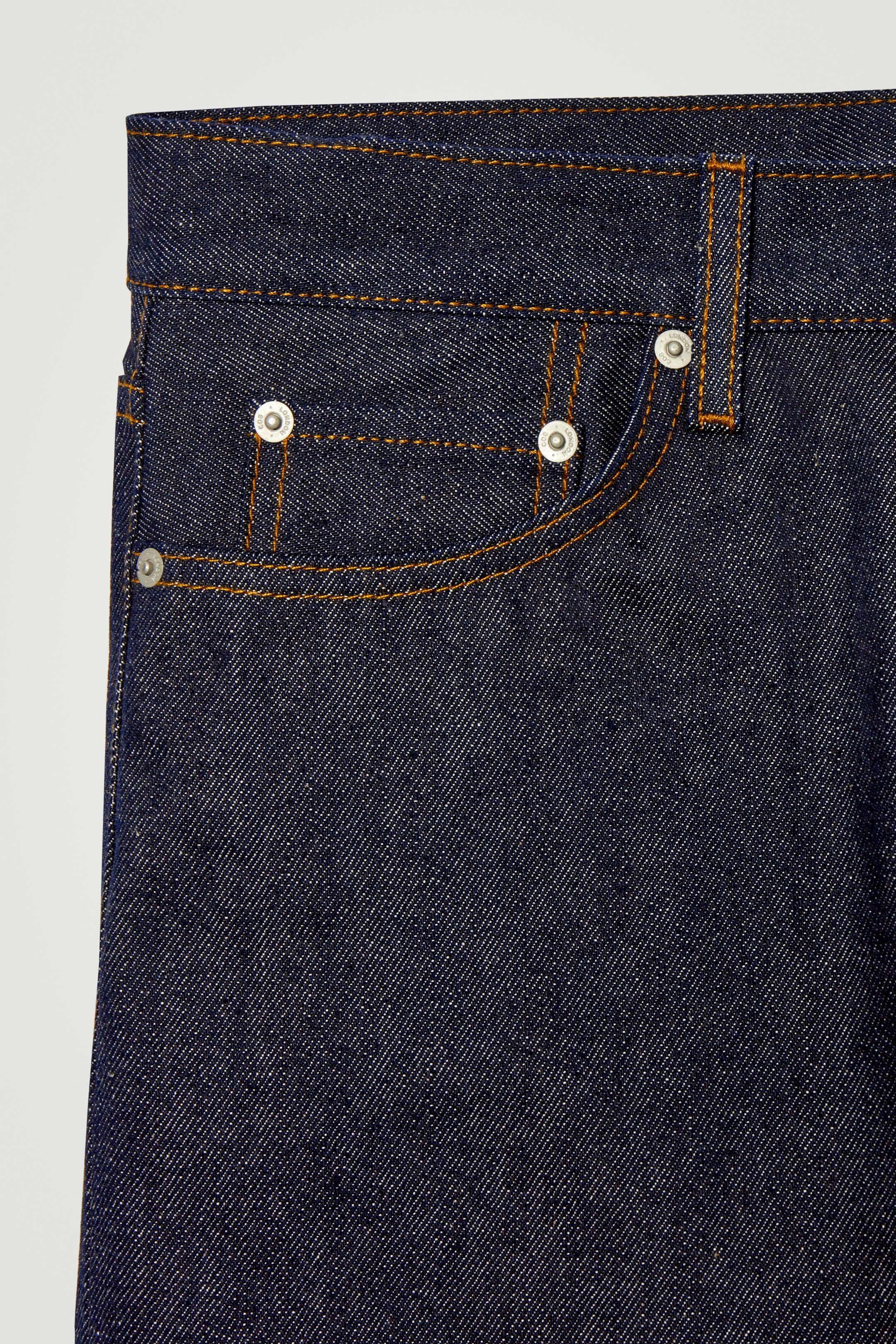 View larger image: PILLAR RAW SELVEDGE TAPERED JEANS - INDIGO - Men | H&M GB 4