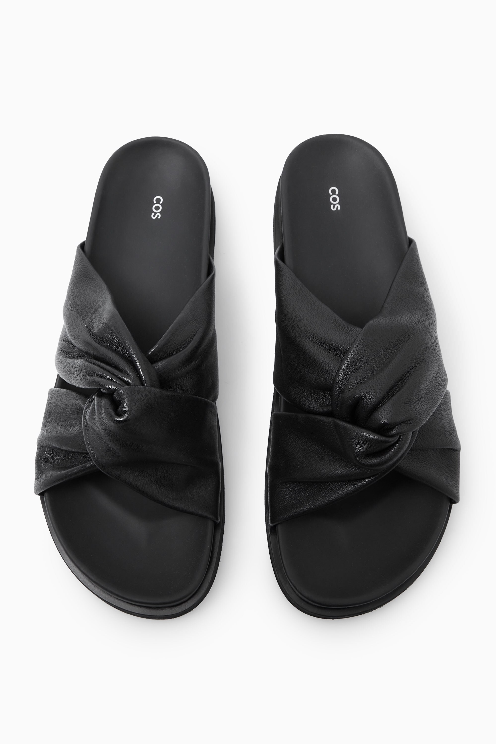 CROSSOVER LEATHER SLIDES - BLACK | COS US