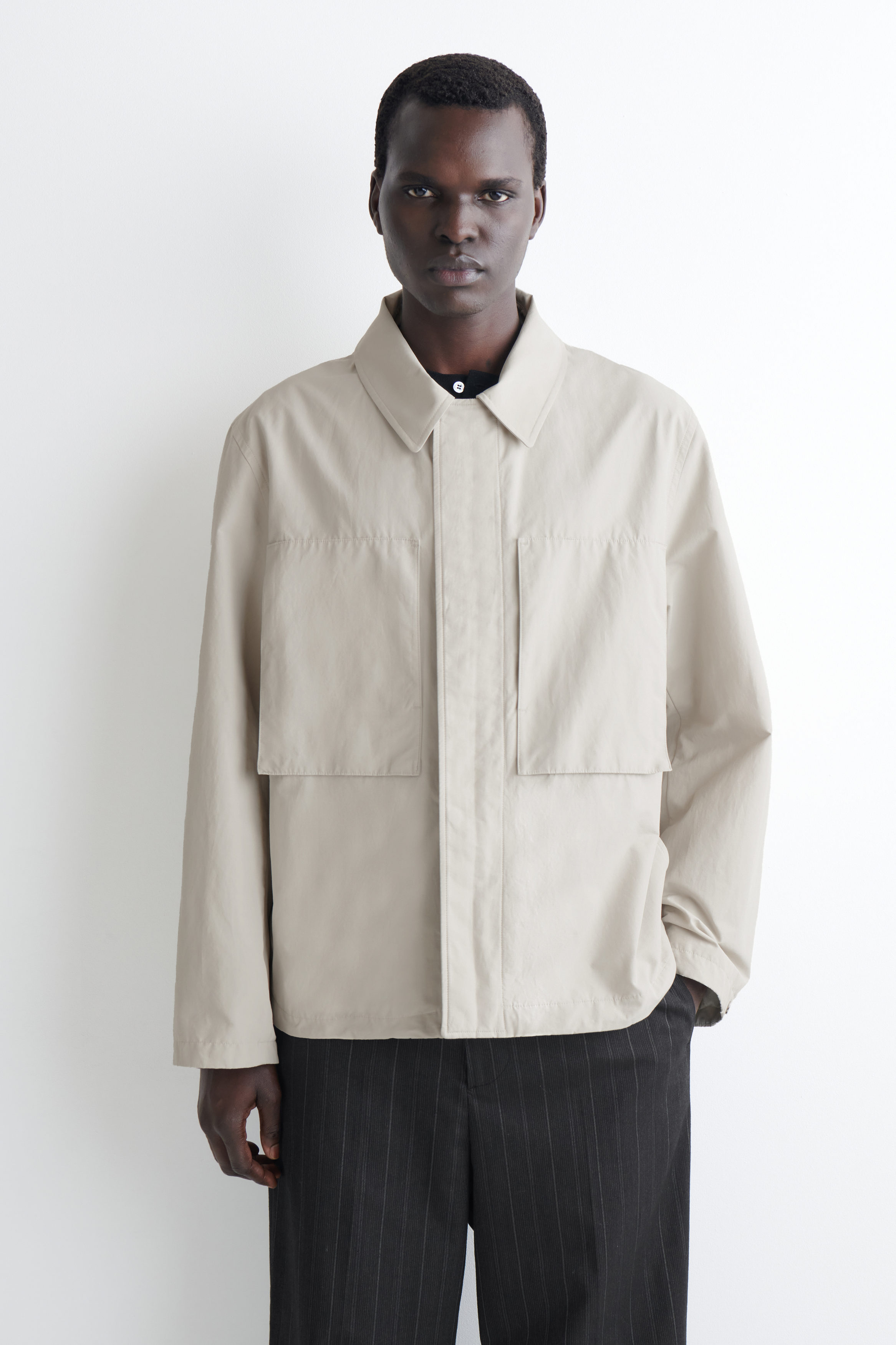 PACKABLE-HOOD WINDBREAKER JACKET - GRAY | COS US
