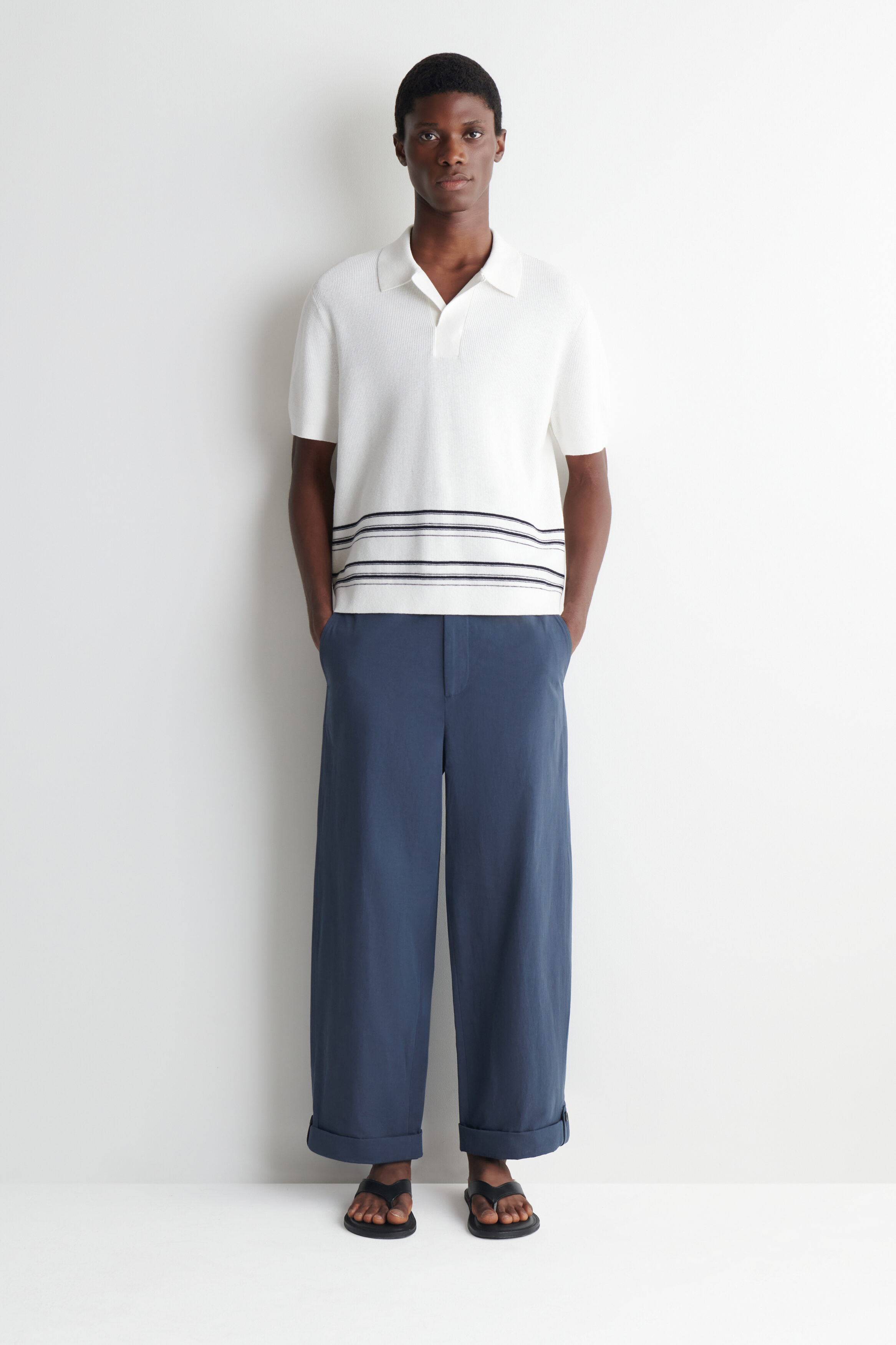 RELAXED-FIT STRAIGHT-LEG CUFFED PANTS - NAVY | COS US