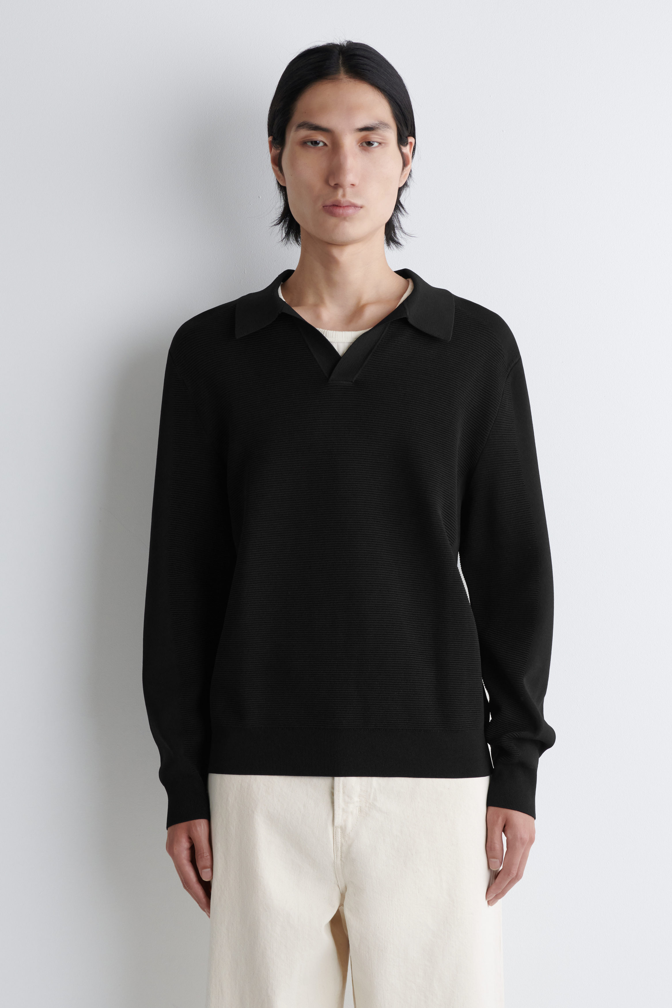 TEXTURED KNITTED POLO JUMPER - BLACK | COS