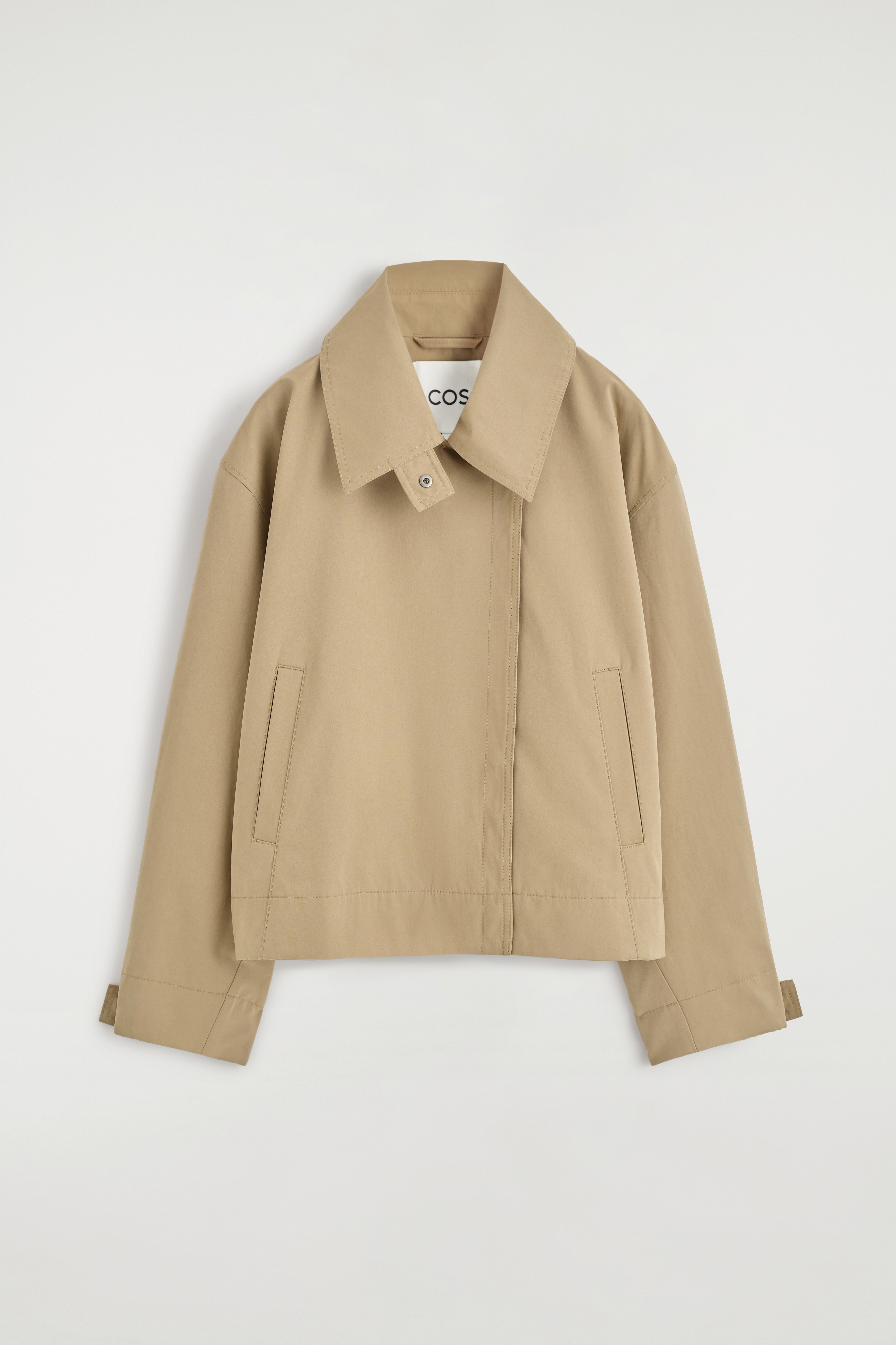 Afgeronde korte trenchjas - buinbeige