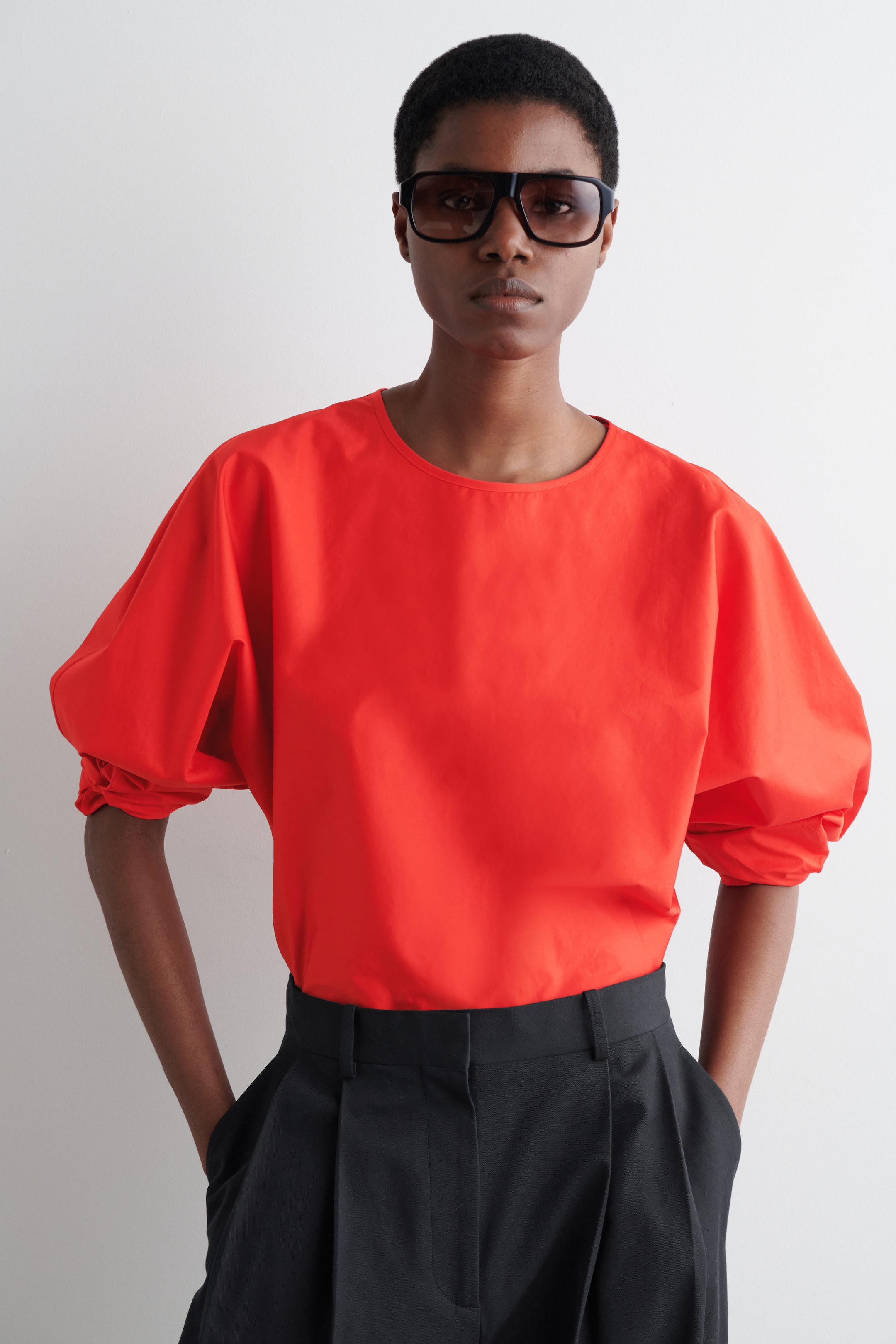 BLOUSE PÉPLUM À CORDON DE SERRAGE