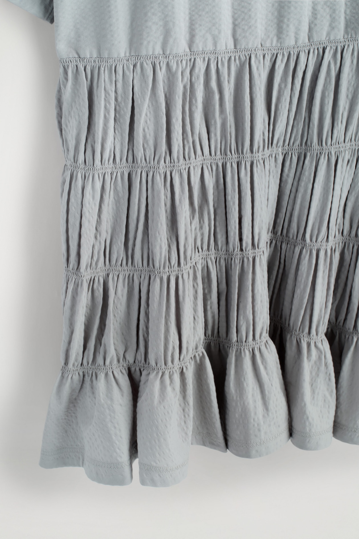 SMOCKED SEERSUCKER MINI DRESS